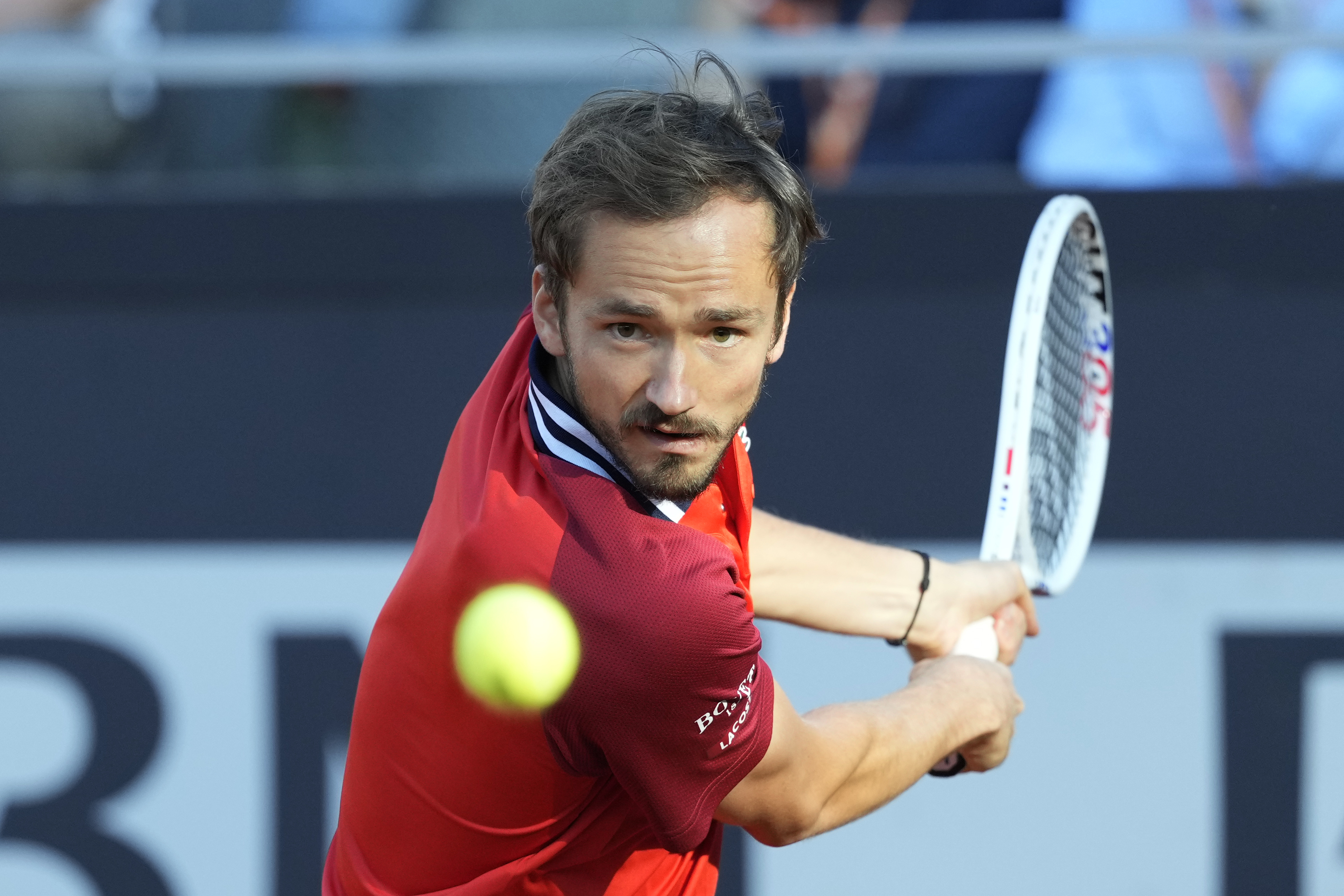 Russia's Daniil Medvedev returns the ball to United States' Tommy Paul at the Italian Open tennis tournament in Rome, Tuesday, May 14, 2024. (AP Photo/Andrew Medichini)