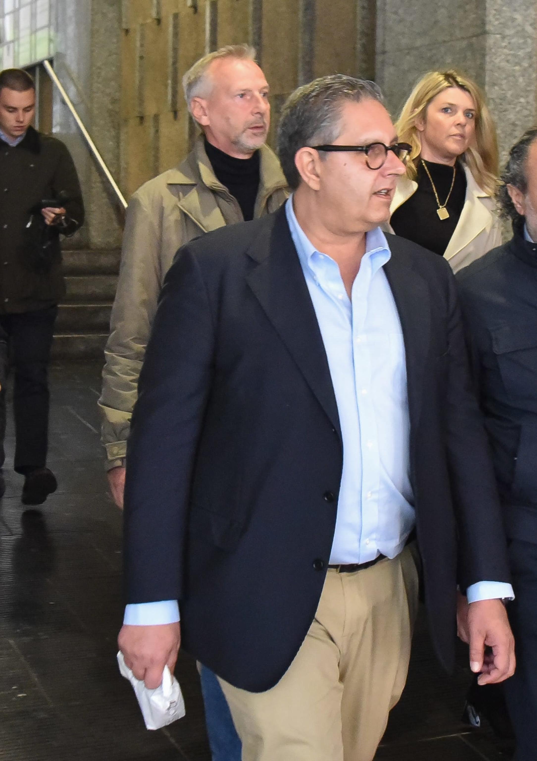 President of Liguria Region, Giovanni Toti  (C) questa mattina  accompanied by the men of the Guardia di Finanza he leaves his home in Genoa to be accompanied to the barracks in Genoa, Italy, 07 May 2024. Liguria Governor Giovanni Toti was put under house arrest on Tuesday in relation to a probe by finance police and the Genoa DDA anti-mafia directorate. The centre-right regional president is accused of corruption, sources said. ANSA/LUCA ZENNARO