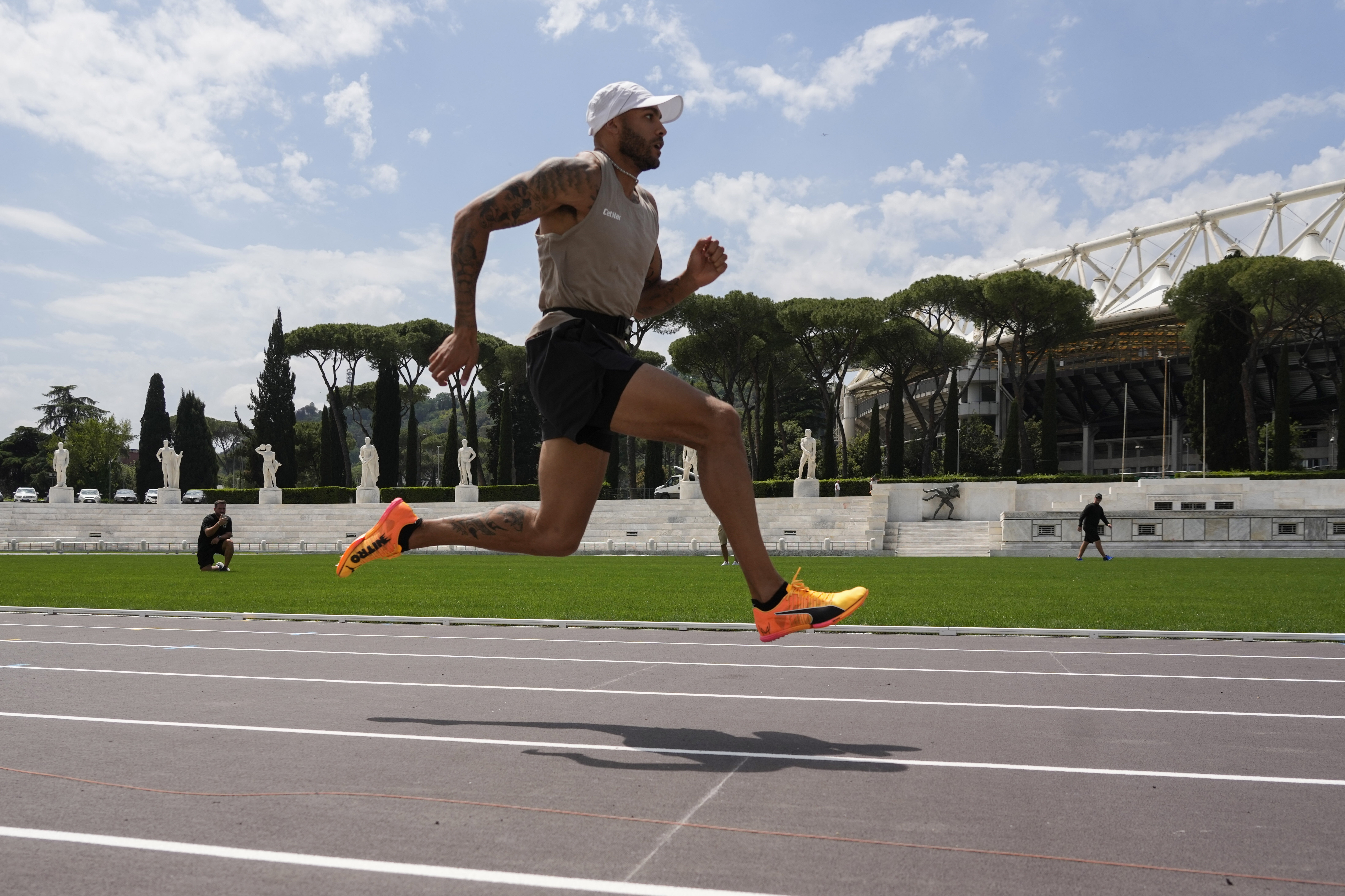 Defending Olympic 100 meters champion Marcell Jacobs runs during a training session in the historic Stadio dei Marmi ahead of an athletics meeting in Rome, Wednesday, May 15, 2024. (AP Photo/Alessandra Tarantino)