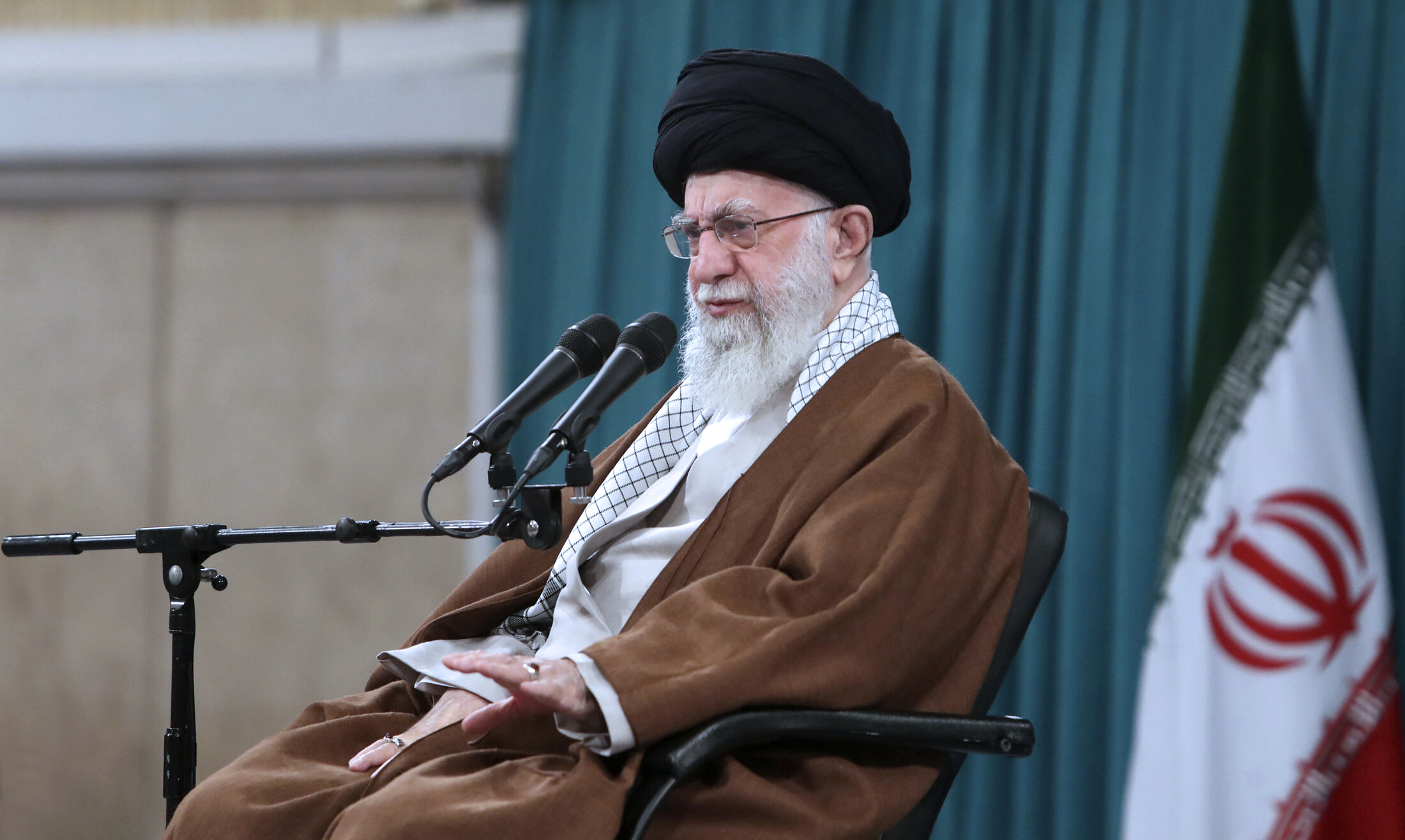 In this photo released by the official website of the office of the Iranian supreme leader, Supreme Leader Ayatollah Ali Khamenei speaks in meeting a group of families of the Revolutionary Guard members in Tehran, Iran, Sunday, May 19, 2024. A helicopter carrying Iranian President Ebrahim Raisi, the country's foreign minister and other officials apparently crashed in the mountainous northwest reaches of Iran on Sunday, sparking a massive rescue operation. "We hope that God the Almighty returns the dear president and his colleagues in full health to the arms of the nation," Khamenei said, drawing an "amen" from the audience he was addressing. (Office of the Iranian Supreme Leader via AP)