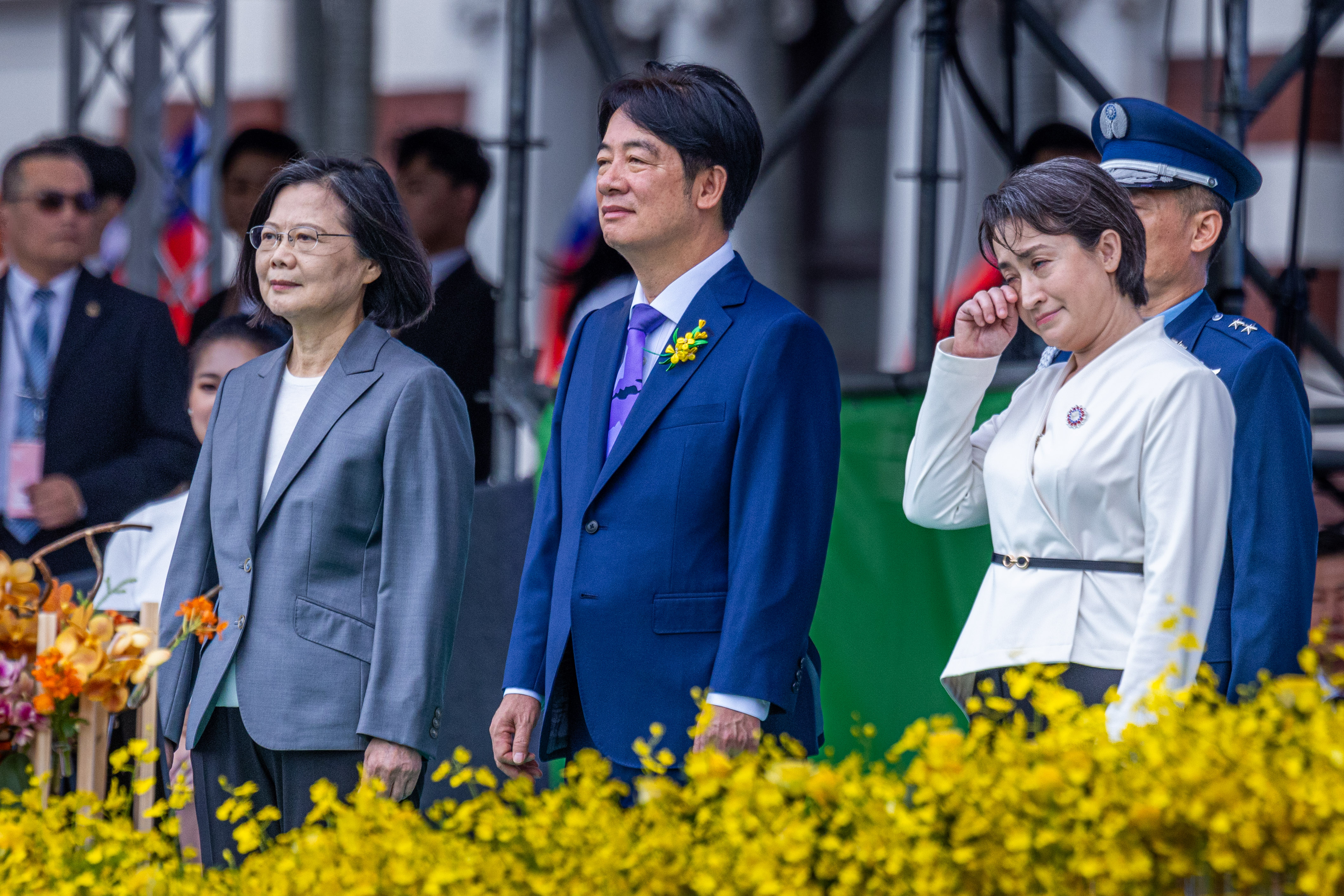 TAIPEI, TAIWAN - MAY 20: (L-R) Taiwan's former President, Tsai Ing-wen, Taiwan's new President, Lai Ching-te, and the new Vice President, Hsiao Bi-khim, show up on the stage during Taiwan's new President Lai Ching-te's inauguration ceremony on May 20, 2024 in Taipei, Taiwan. Lai urged China to stop its military threats against Taiwan in his inaugural address. Lai is expected to continue the policies of outgoing president Tsai Ing-wen, who was barred from running again after two terms. He has vowed to maintain peace with China while defending Taiwan's sovereignty. The inauguration ceremony will be attended by foreign dignitaries, underscoring Taiwan's growing international profile under Tsai's leadership. Lai faces the challenge of balancing relations with the U.S. and China while navigating a politically divided legislature at home. (Photo by Annabelle Chih/Getty Images)
