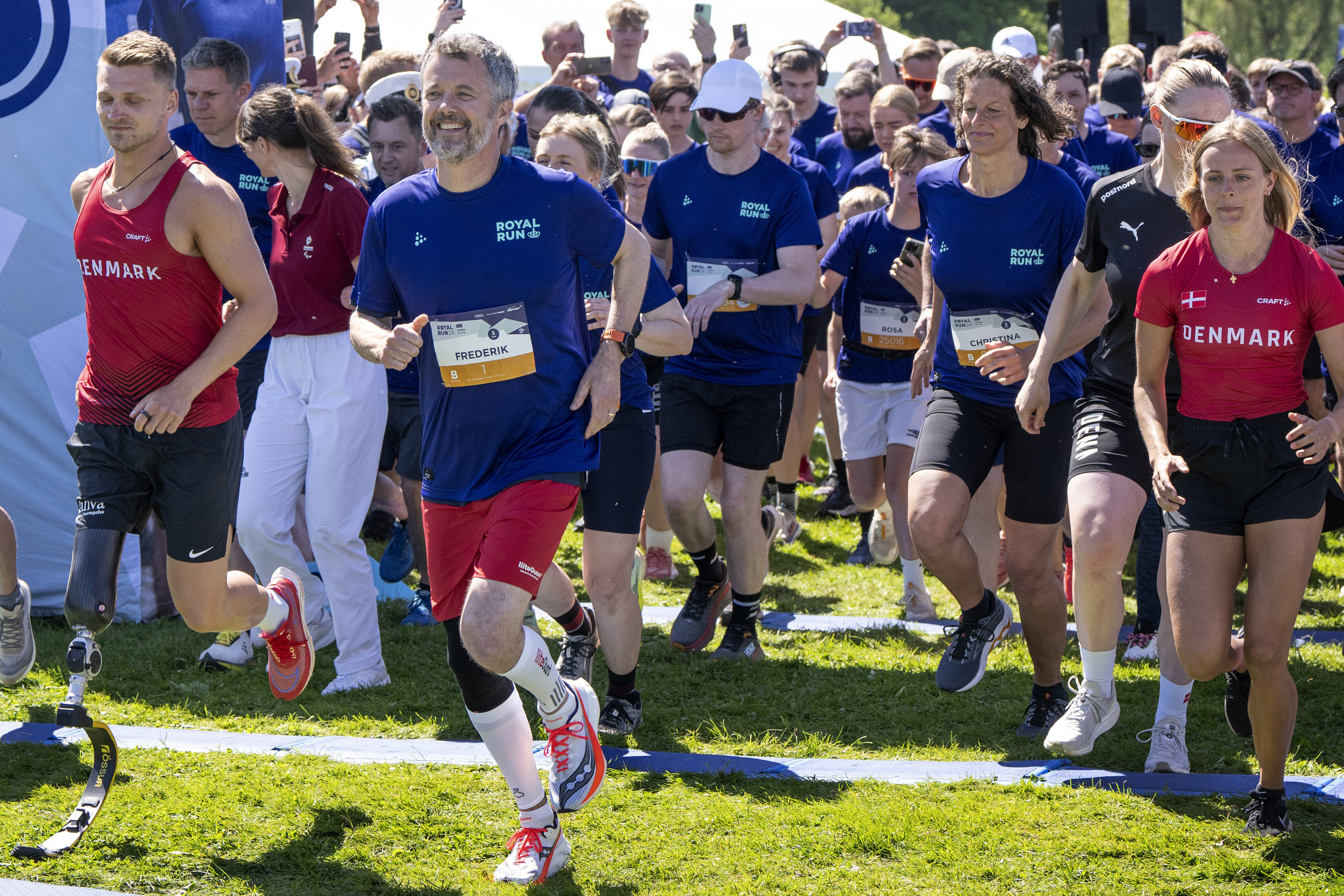 Denmark's King Frederick X, front, runs five kilometers during the Royal Run in Mindeparken in Aarhus, Denmark, Monday, May 20, 2024. The Royal Run is an annual fitness run that takes place in several Danish cities. (Bo Amstrup/Ritzau Scanpix via AP)