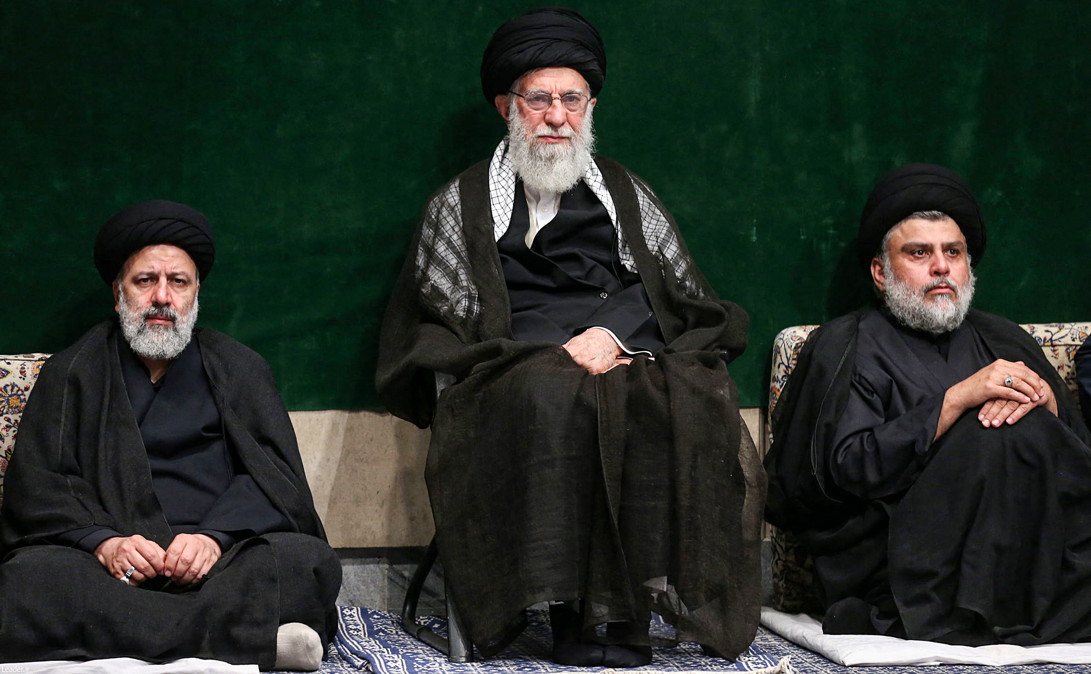 (FILES) A handout picture provided by the office of Iran's Supreme Leader Ayatollah Ali Khamenei on September 10, 2019 shows (L to R) Iranian judiciary chief Ebrahim Raisi, Supreme Leader Ayatollah Ali Khamenei, and Iraqi Shiite cleric, politician, and militia leader Muqtada al-Sadr sitting during a ceremony commemorating Ashura in the capital Tehran. Iranian media declared President Ebrahim Raisi dead on May 20, 2024 after his helicopter crashed in a mountainous northwestern region, but there has not yet been any official confirmation. Contact was lost with the aircraft carrying him as well as Foreign Minister Hossein Amir-Abdollahian and others in East Azerbaijan province on May 19, 2024, reports said. (Photo by KHAMENEI.IR / AFP) / === RESTRICTED TO EDITORIAL USE - MANDATORY CREDIT "AFP PHOTO / HO / KHAMENEI.IR" - NO MARKETING NO ADVERTISING CAMPAIGNS - DISTRIBUTED AS A SERVICE TO CLIENTS ===