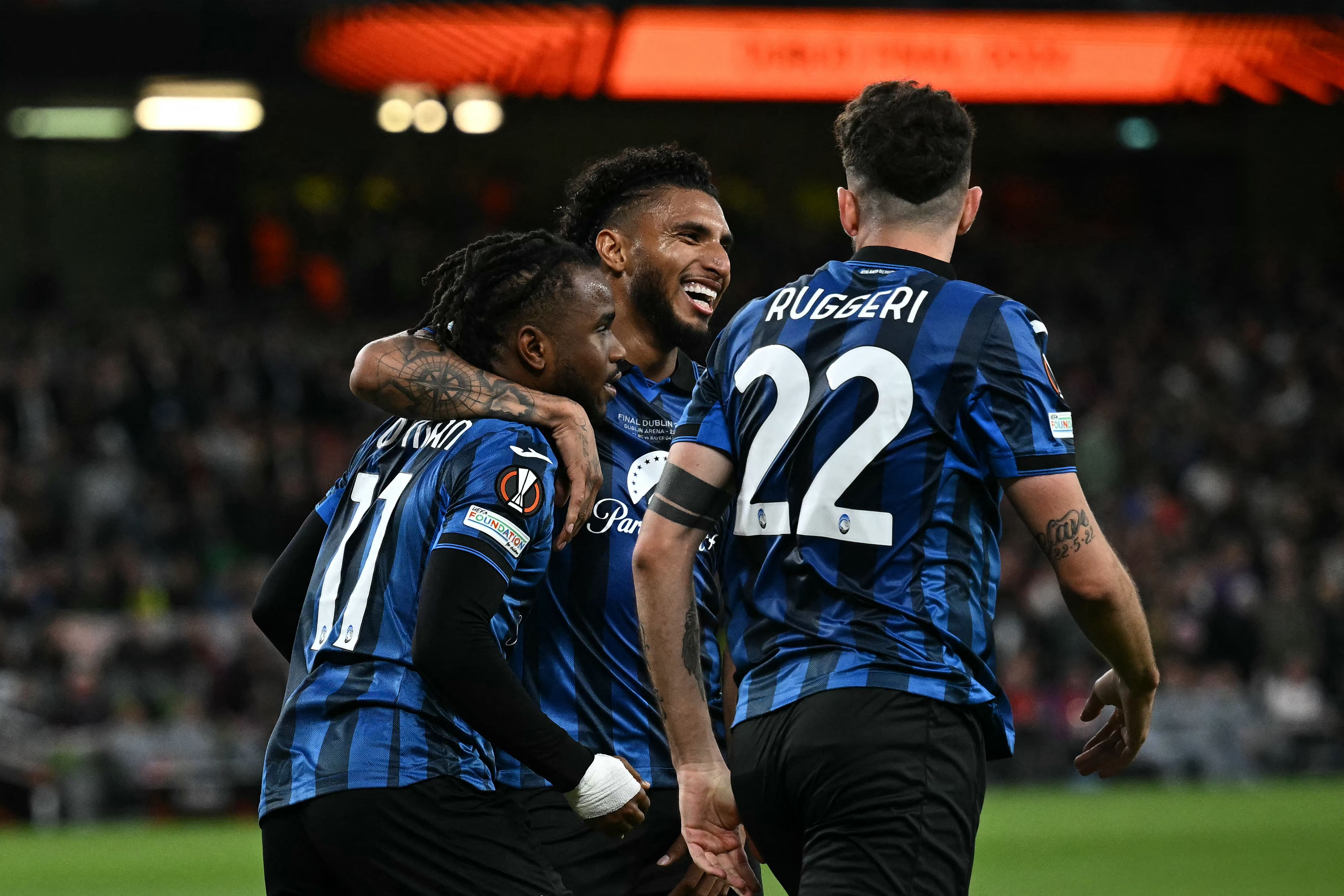 Atalanta's Nigerian forward #11 Ademola Lookman (L) celebrates with teammates after scoring his team's third goal during the UEFA Europa League final football match between Atalanta and Bayer Leverkusen at the Dublin Arena stadium, in Dublin, on May 22, 2024. (Photo by Ben Stansall / AFP)