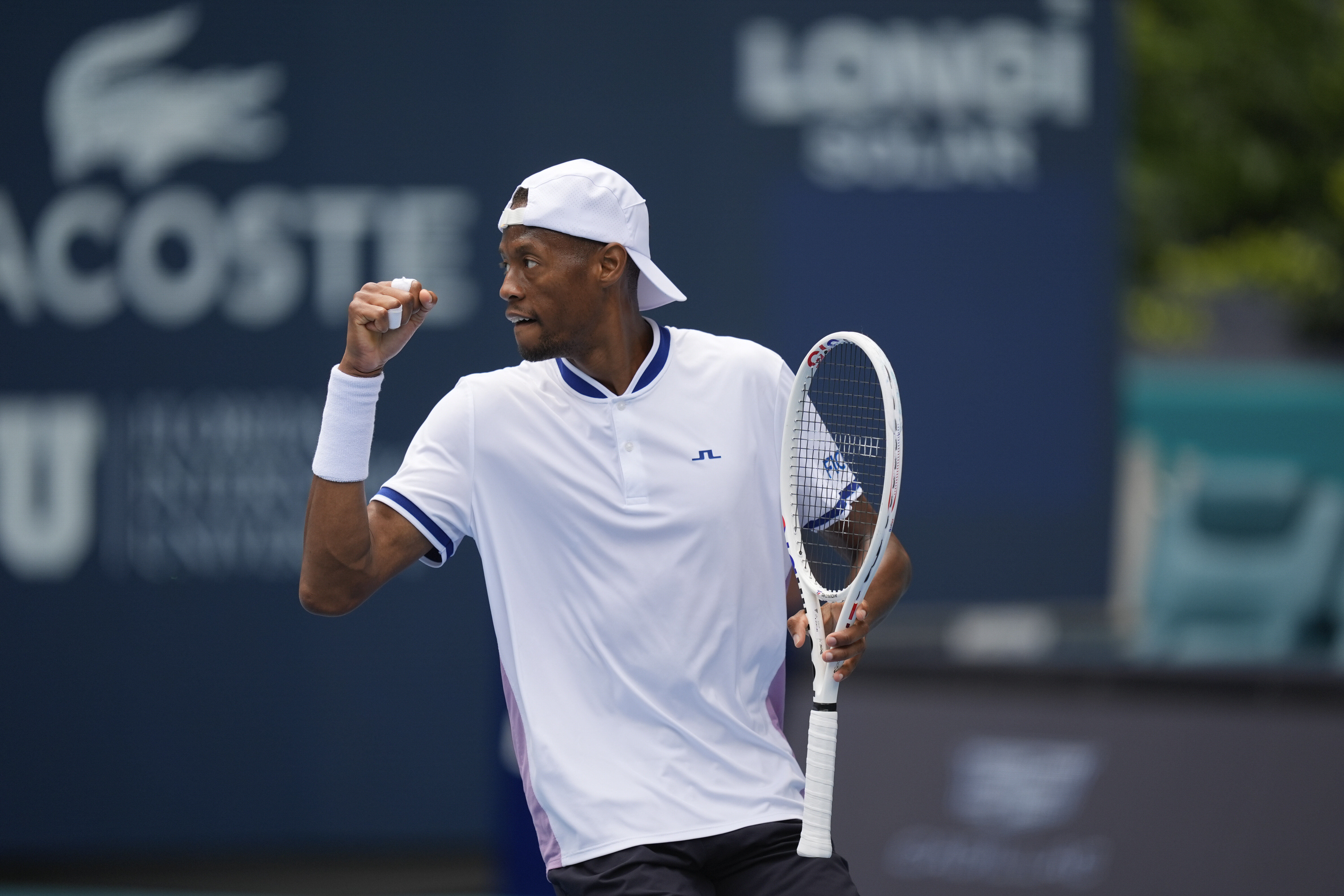 Christopher Eubanks celebrates winning a point against Alexander Zverev, of Germany, in their men's third round match at the Miami Open tennis tournament, Monday, March 25, 2024, in Miami Gardens, Fla. (AP Photo/Rebecca Blackwell)
