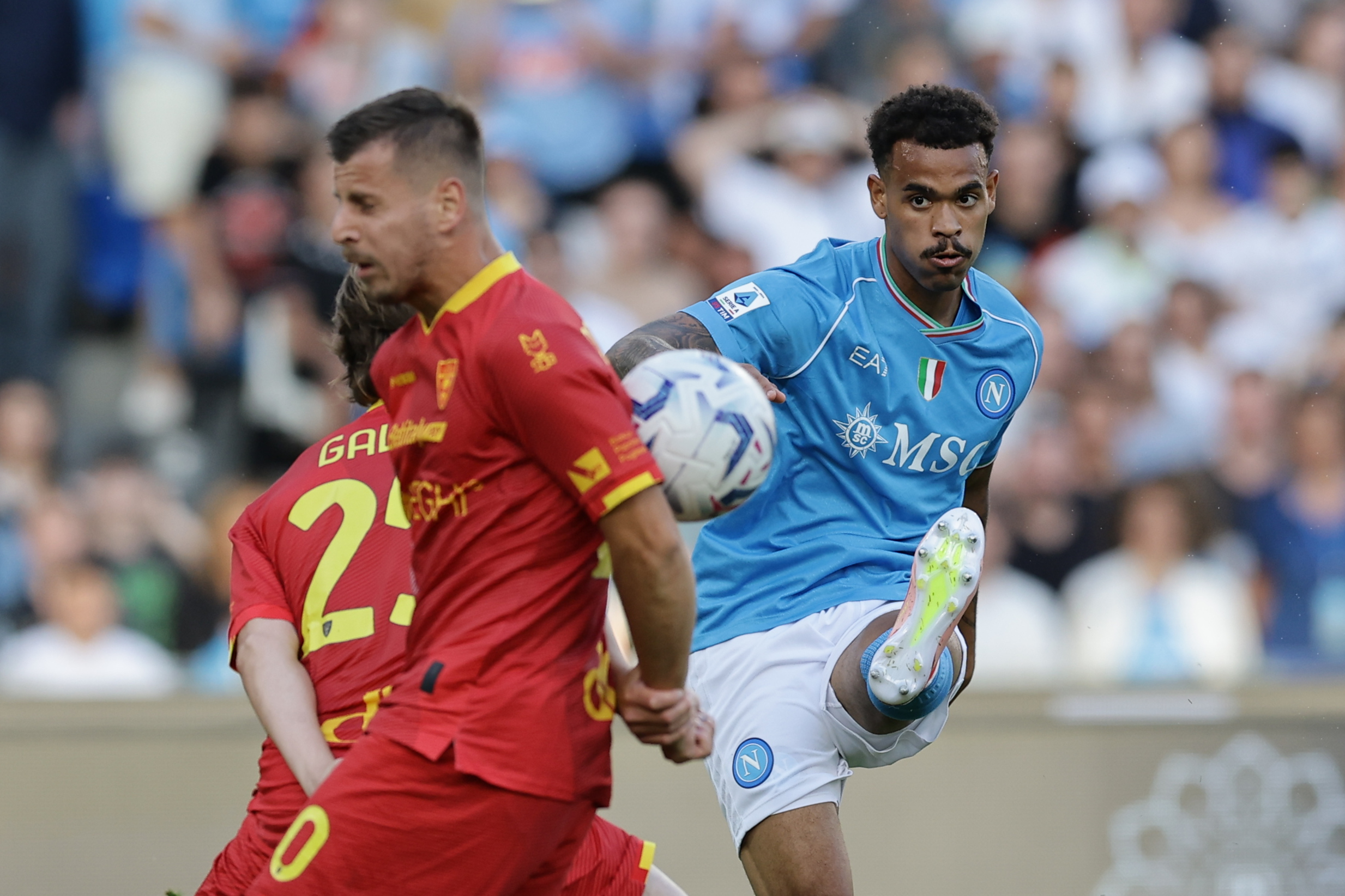Napoli's Cyril Ngonge challenges for the ball with Lecce?s Ylber Ramadani  during the Serie A soccer match between Napoli and Lecce at the Diego Armando Maradona Stadium in Naples, southern Italy - Sunday, May 26 , 2024. Sport - Soccer .  (Photo by Alessandro Garofalo/Lapresse)