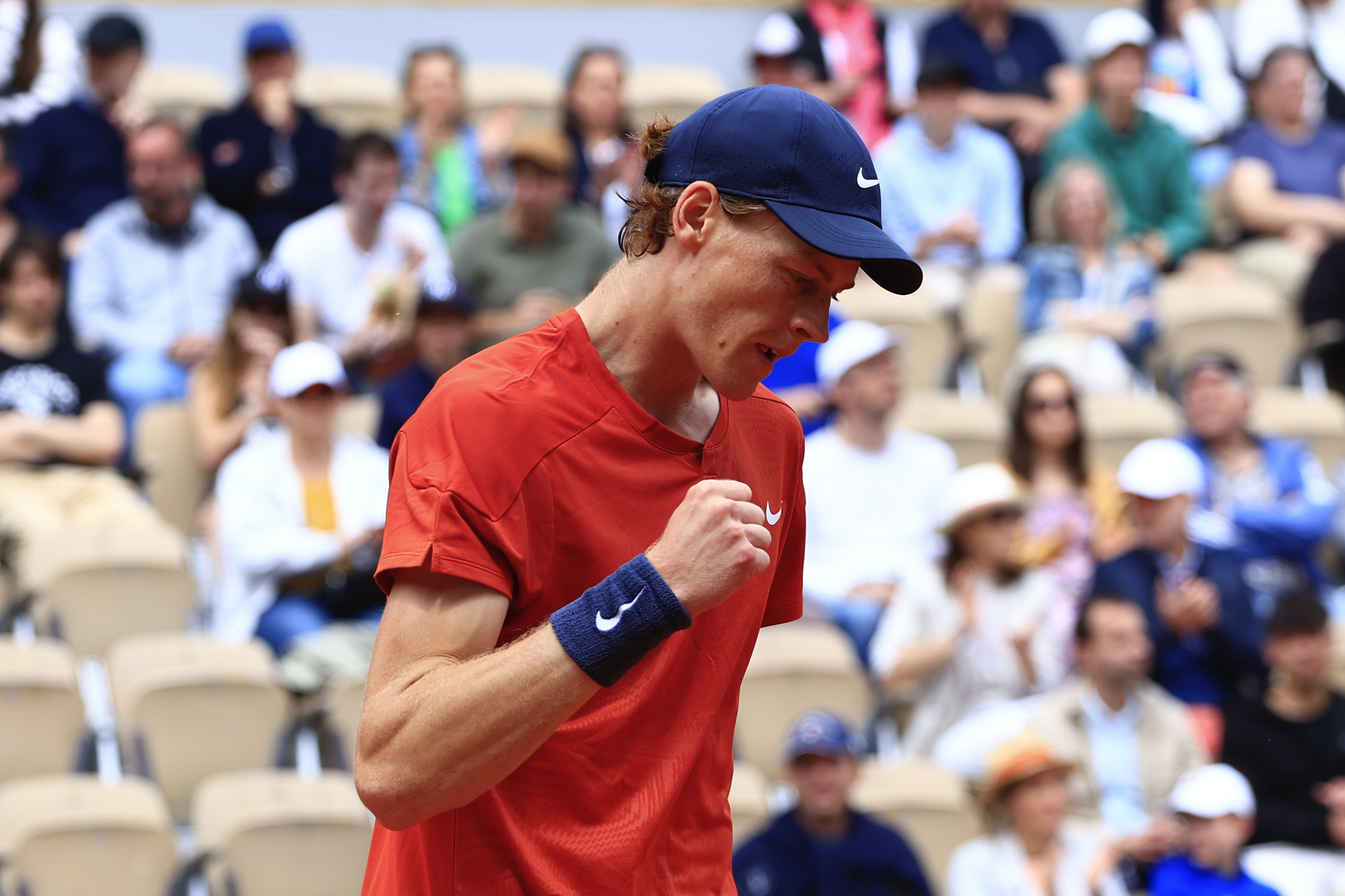 Italy's Jannik Sinner clenches his fist after scoring a point against Christopher Eubanks of the U.S. during their first round match of the French Open tennis tournament at the Roland Garros stadium in Paris, Monday, May 27, 2024. (AP Photo/Aurelien Morissard)