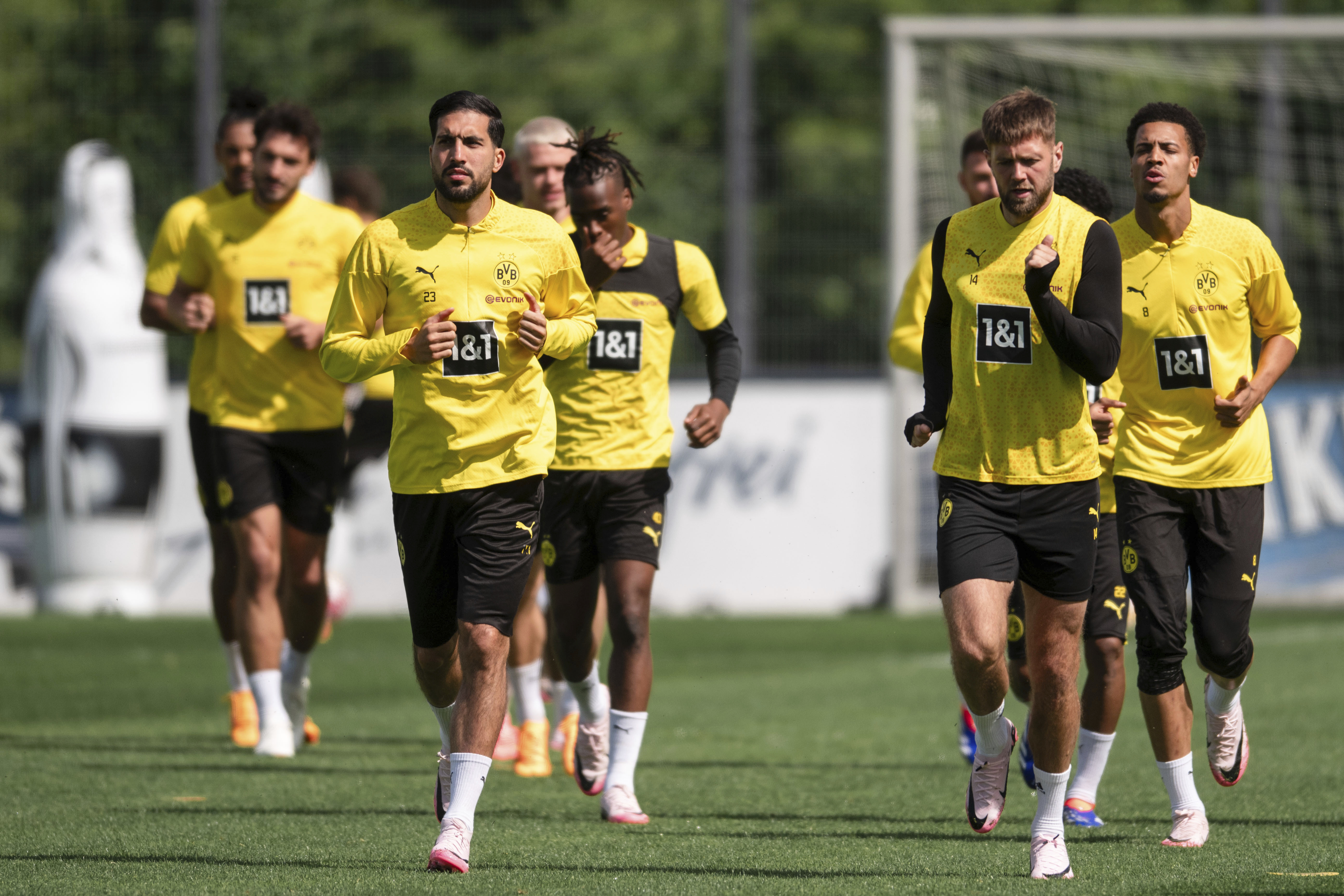 Borussia Dortmund's Emre Can, left, and Niclas Füllkrug and teammates attend a team training session in Cologne, Germany, Tuesday, May 28, 2024, ahead of their Champions League final against Real Madrid in London on Saturday. (Marius Becker/dpa via AP)