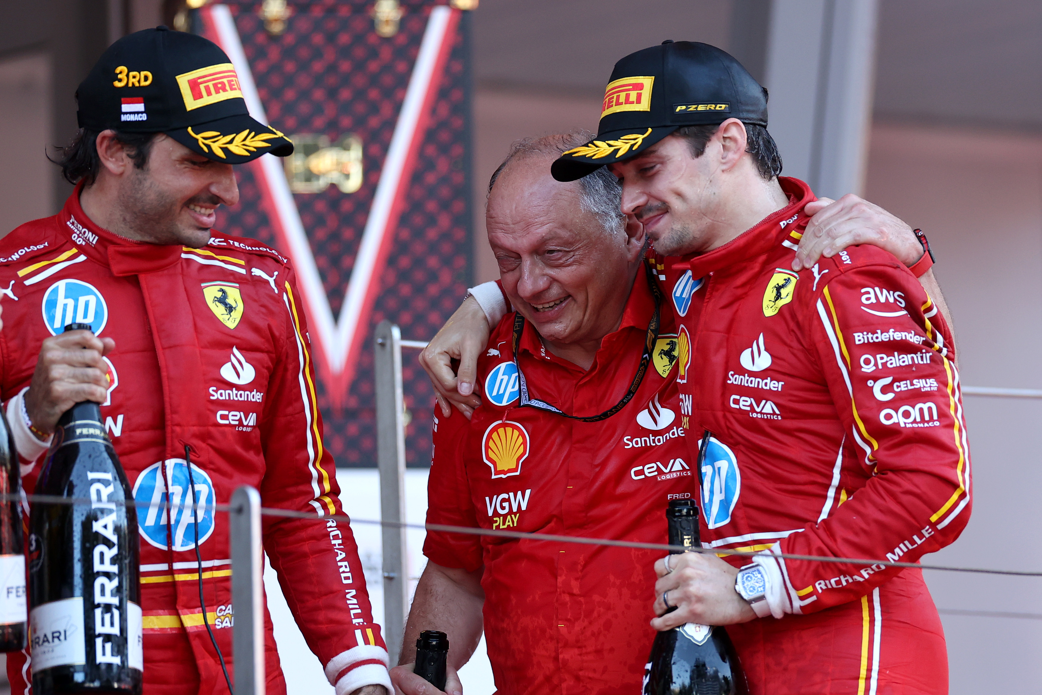 MONTE-CARLO, MONACO - MAY 26: Race winner Charles Leclerc of Monaco and Ferrari, Third placed Carlos Sainz of Spain and Ferrari and Ferrari Team Principal Frederic Vasseur celebrate on the podium during the F1 Grand Prix of Monaco at Circuit de Monaco on May 26, 2024 in Monte-Carlo, Monaco. (Photo by Ryan Pierse/Getty Images)