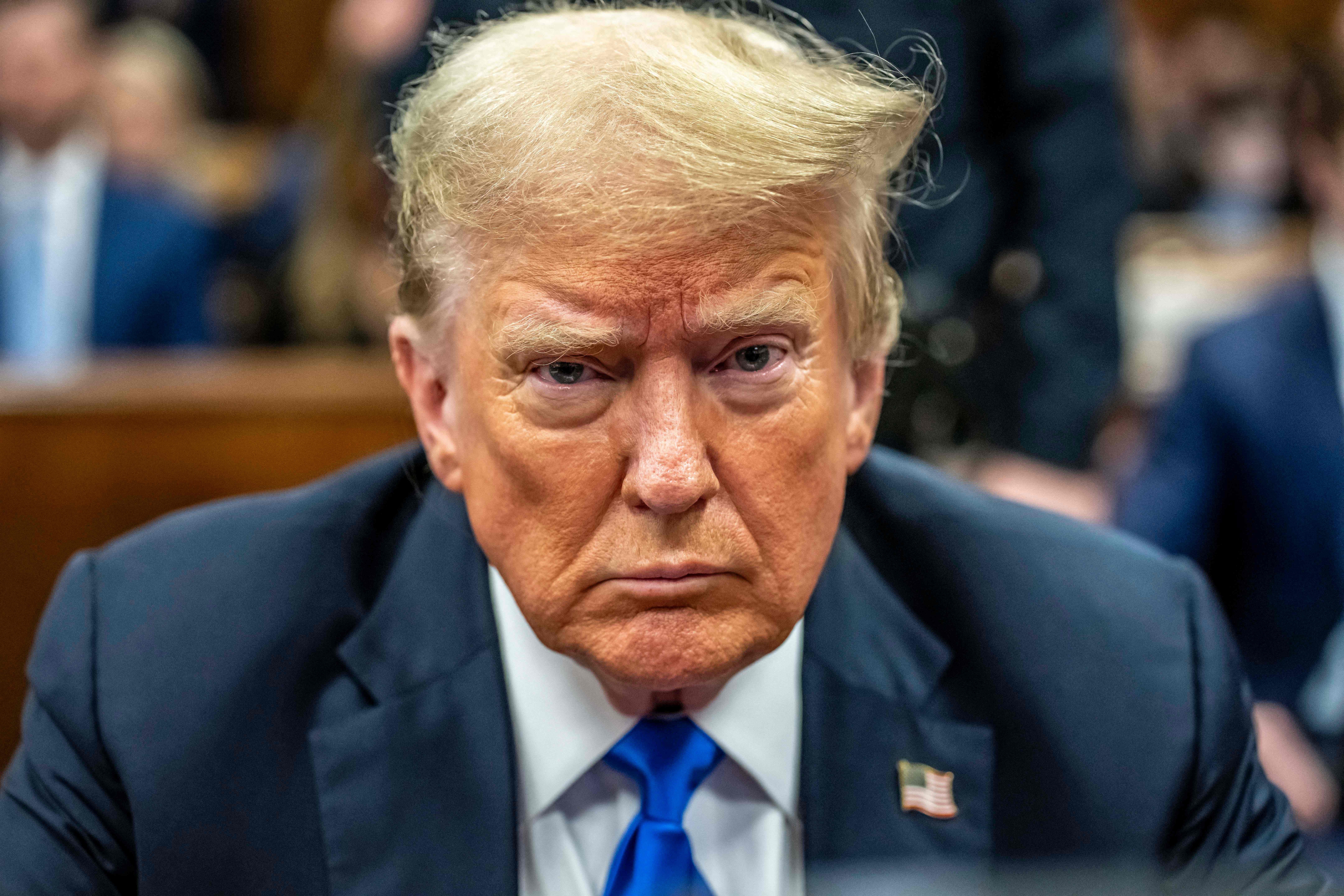 TOPSHOT - Former US President and Republican presidential candidate Donald Trump attends his criminal trial at Manhattan Criminal Court in New York City, on May 30, 2024. Jurors return Thursday to a second day of deliberations in Donald Trump's criminal trial, leaving the Republican presidential candidate and the country waiting for a decision that could upend November's election. (Photo by Mark Peterson / POOL / AFP)