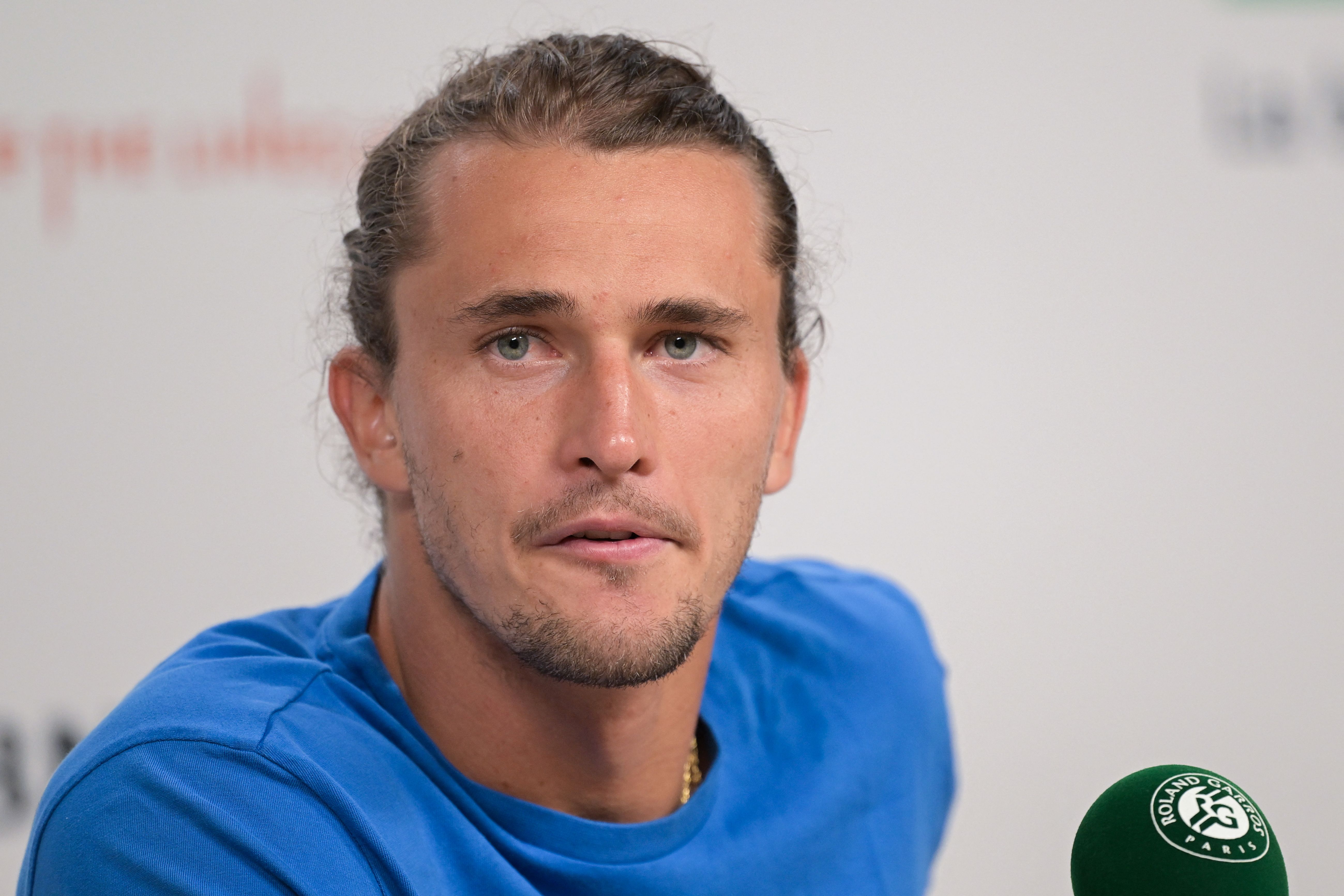 Germany's Alexander Zverev reacts as he addresses a press conference on day five of the French Open tennis tournament at the Roland Garros Complex in Paris on May 30, 2024. (Photo by Bertrand GUAY / AFP)