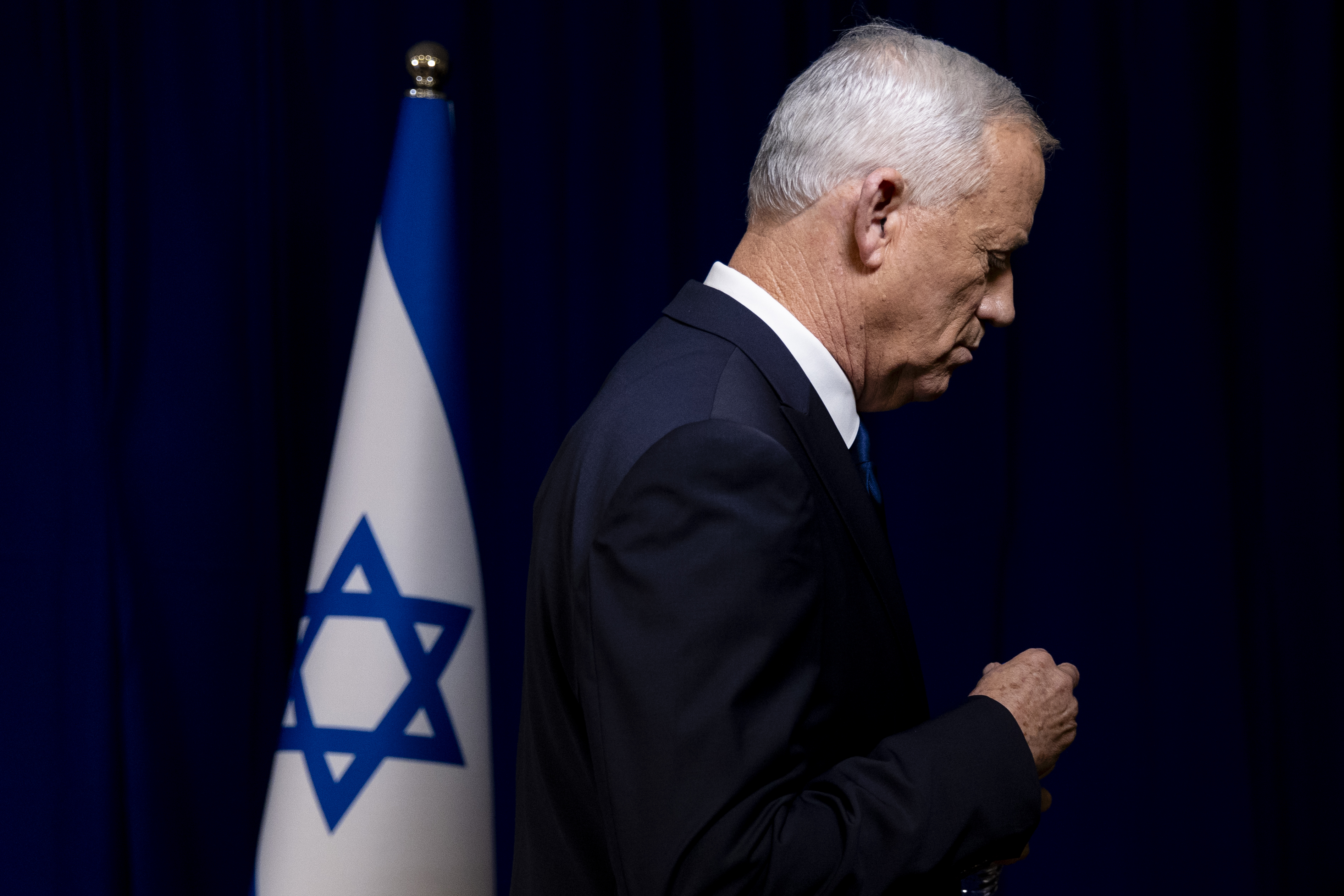 TEL AVIV, ISRAEL - JUNE 9: Benny Gantz, a member of the country's wartime cabinet, departs after announcing his resignation during a press conference on June 9, 2024 in Tel Aviv, Israel. Gantz had been pressuring the prime minister for a plan on post-war governance in Gaza, as well as progress on a deal to secure the release of Israeli hostages held in Gaza. Gantz had originally scheduled this press conference for last night but postponed it following the rescue of four Israeli hostages from Gaza. (Photo by Amir Levy/Getty Images)