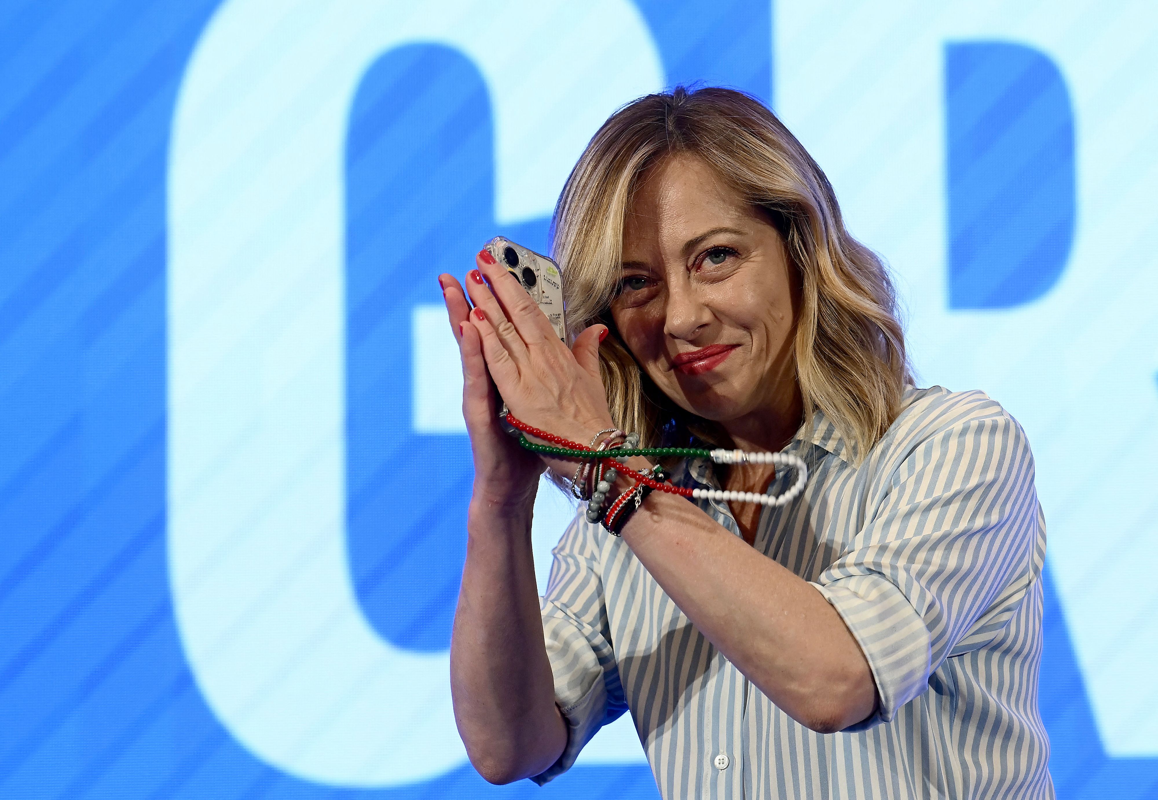 Italy's Prime Minister and leader of the far-right party Brothers of Italy (Fratelli D'Italia - FDI) Giorgia Meloni getures during a press conference following the results of the European Elections in Rome on June 10, 2024. Europe's far-right parties were winners in many places, coming out on top in France, Italy and Austria, while Germany's AfD came second -- but still ahead of Chancellor Olaf Scholz's SPD party -- and the hard-right also did well in the Netherlands. (Photo by Filippo MONTEFORTE / AFP)