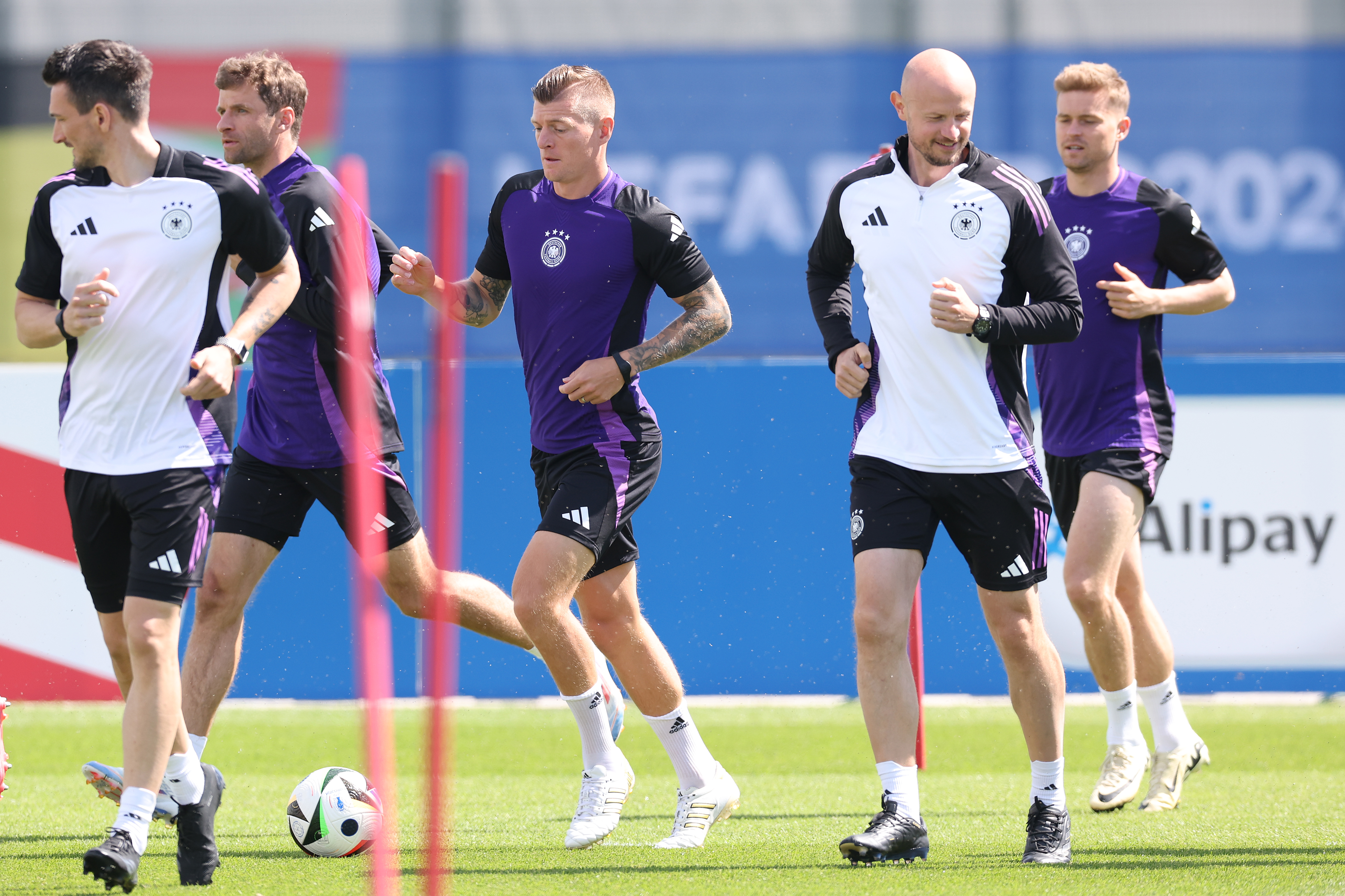 HERZOGENAURACH, GERMANY - JUNE 13: Toni Kroos of Germany runs with the ball during a training session at Herzo-Base on June 13, 2024 in Herzogenaurach, Germany. (Photo by Alexander Hassenstein/Getty Images)