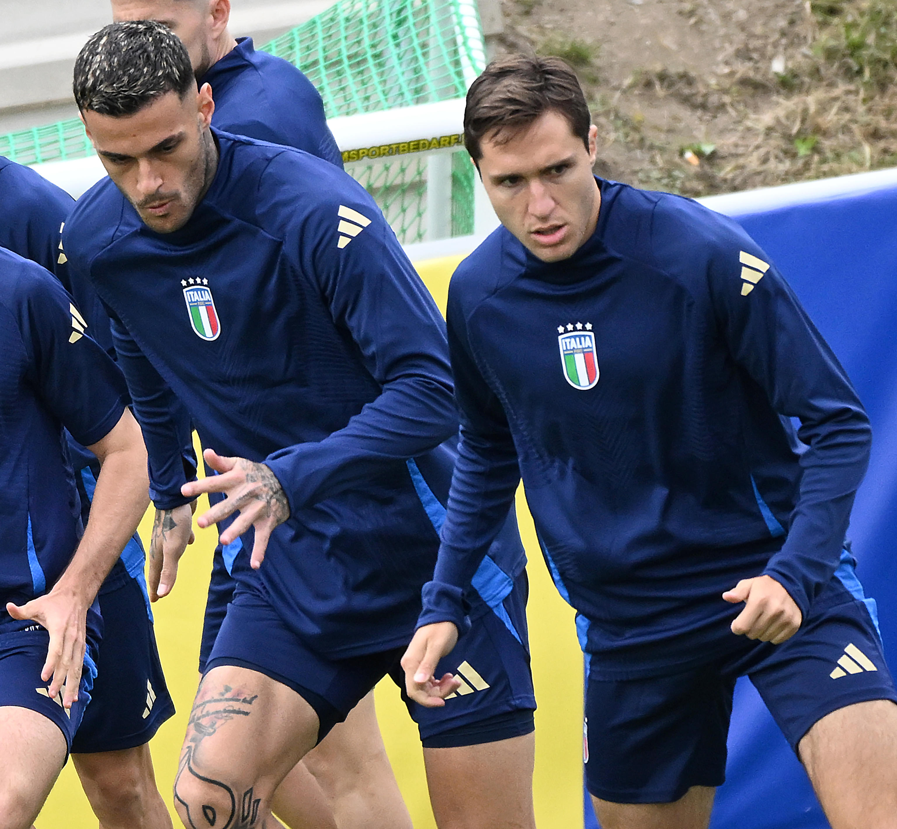 Italys forwards Gianluca Scamacca (L) and Federico Chiesa during a training session at the Hemberg Stadion Nord Halle in Iserlhon, Germany, 14 June 2024.  Italy will play their first match at the UEFA EURO 2024 against Albania on 15 June 2024ANSA/DANIEL DAL ZENNARO