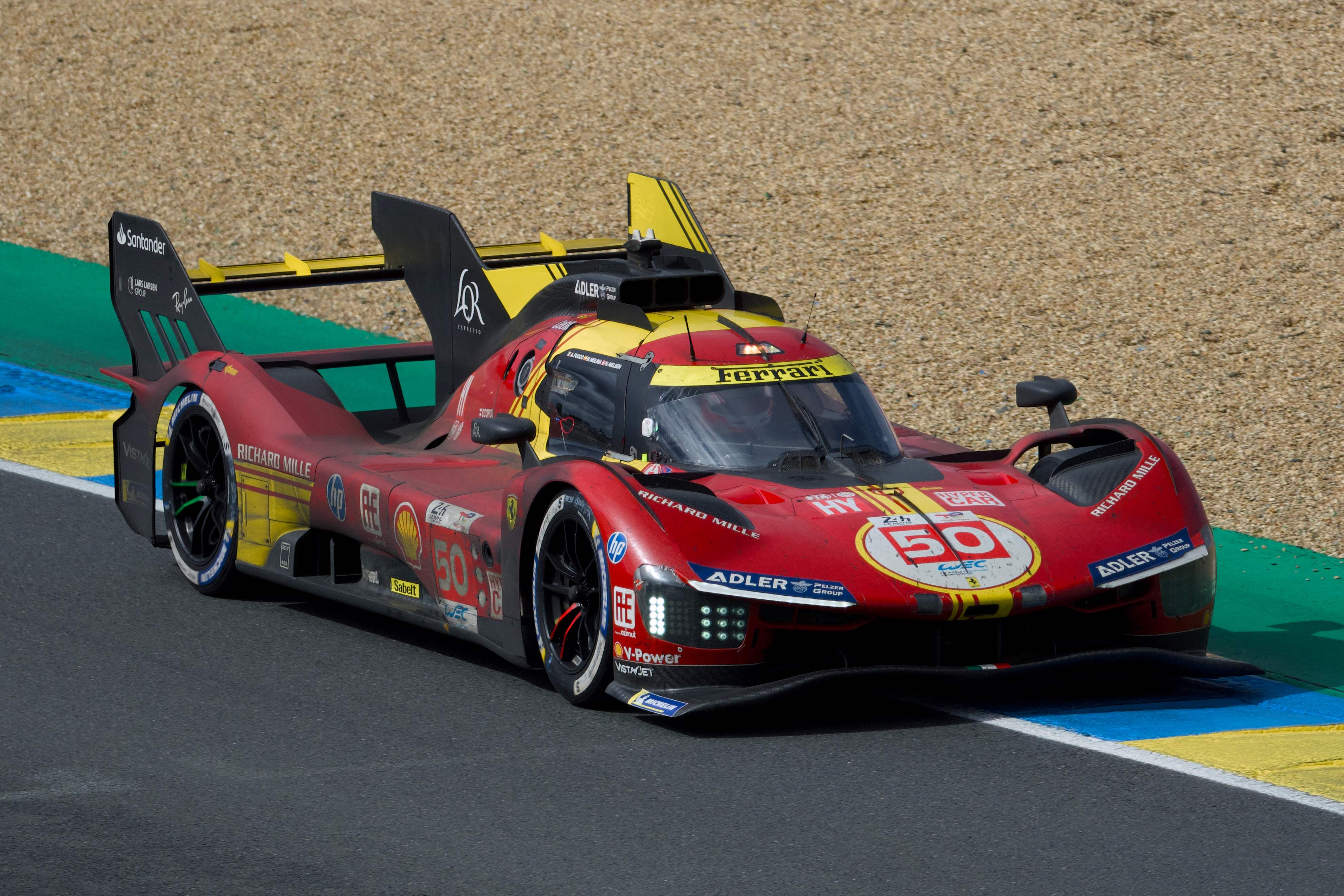 Spanish driver Miguel Molina steers the Ferrari 499P Hybrid Hypercar WEC's during Le Mans 24-hours endurance race in Le Mans, western France, on June 16, 2024. (Photo by GUILLAUME SOUVANT / AFP)