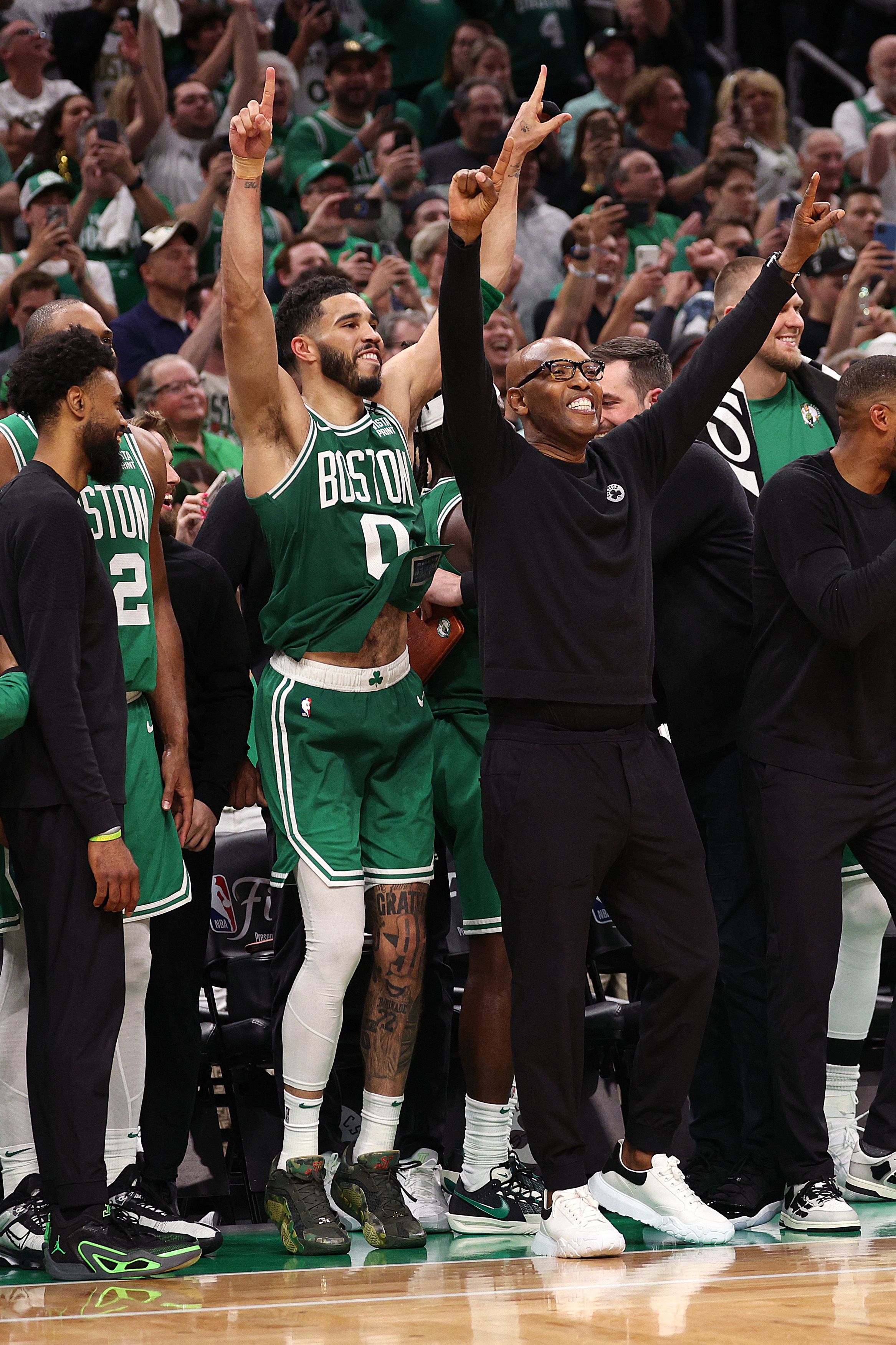 BOSTON, MASSACHUSETTS - JUNE 17: Jayson Tatum #0 of the Boston Celtics celebrates during the closing seconds of the fourth quarter of Game Five of the 2024 NBA Finals against the Dallas Mavericks at TD Garden on June 17, 2024 in Boston, Massachusetts. NOTE TO USER: User expressly acknowledges and agrees that, by downloading and or using this photograph, User is consenting to the terms and conditions of the Getty Images License Agreement.   Elsa/Getty Images/AFP (Photo by ELSA / GETTY IMAGES NORTH AMERICA / Getty Images via AFP)