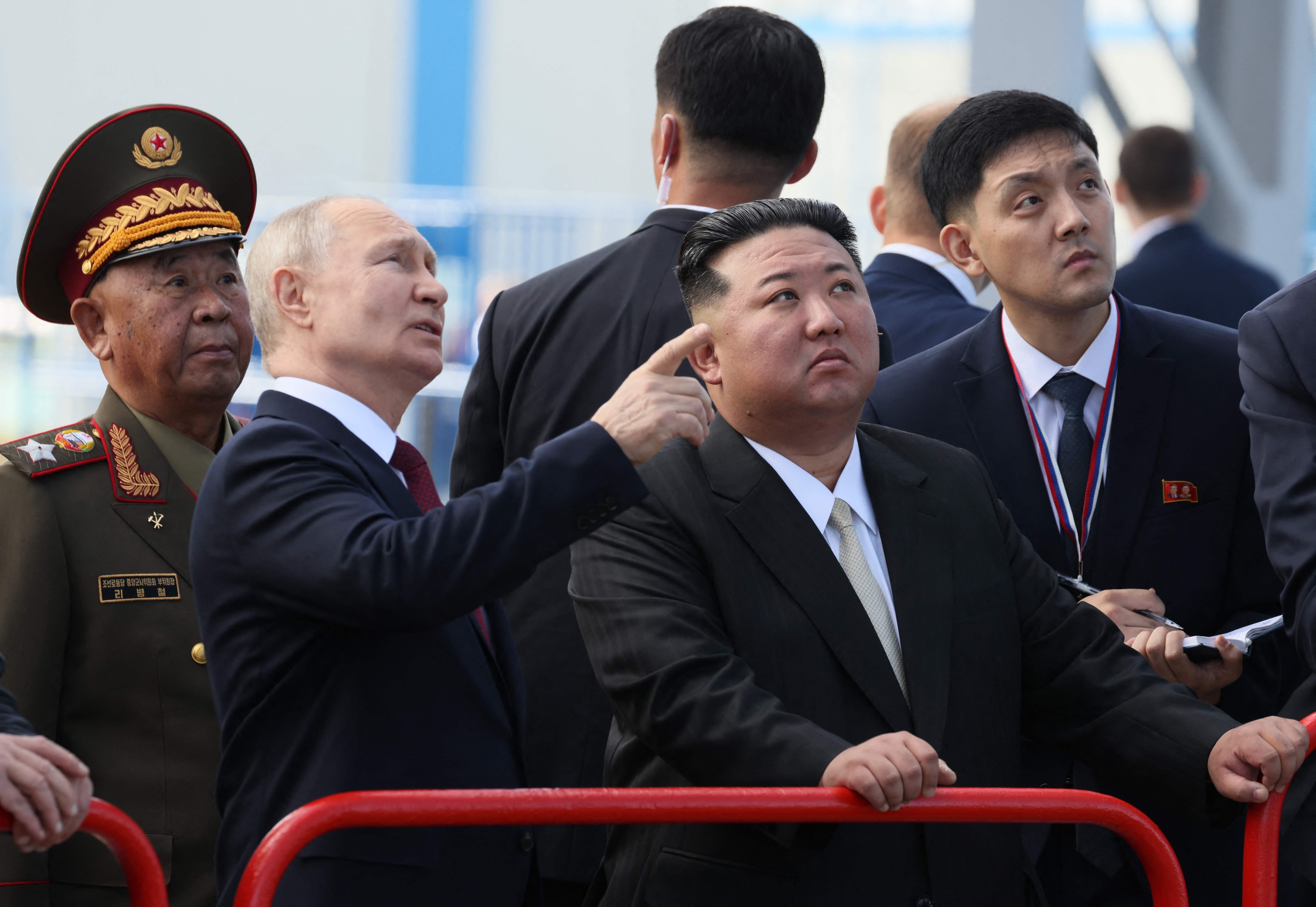 (FILES) In this pool photo distributed by Sputnik agency, Russia's President Vladimir Putin (centre L) and North Korea's leader Kim Jong Un (centre R) visit the Vostochny Cosmodrome in Amur region on September 13, 2023. North Korean leader Kim Jong Un on June 12, 2024 hailed his country's ties with Russia, saying the two nations were "invincible comrades-in-arms", amid reports President Vladimir Putin will visit Pyongyang imminently. (Photo by Mikhail Metzel / POOL / AFP)