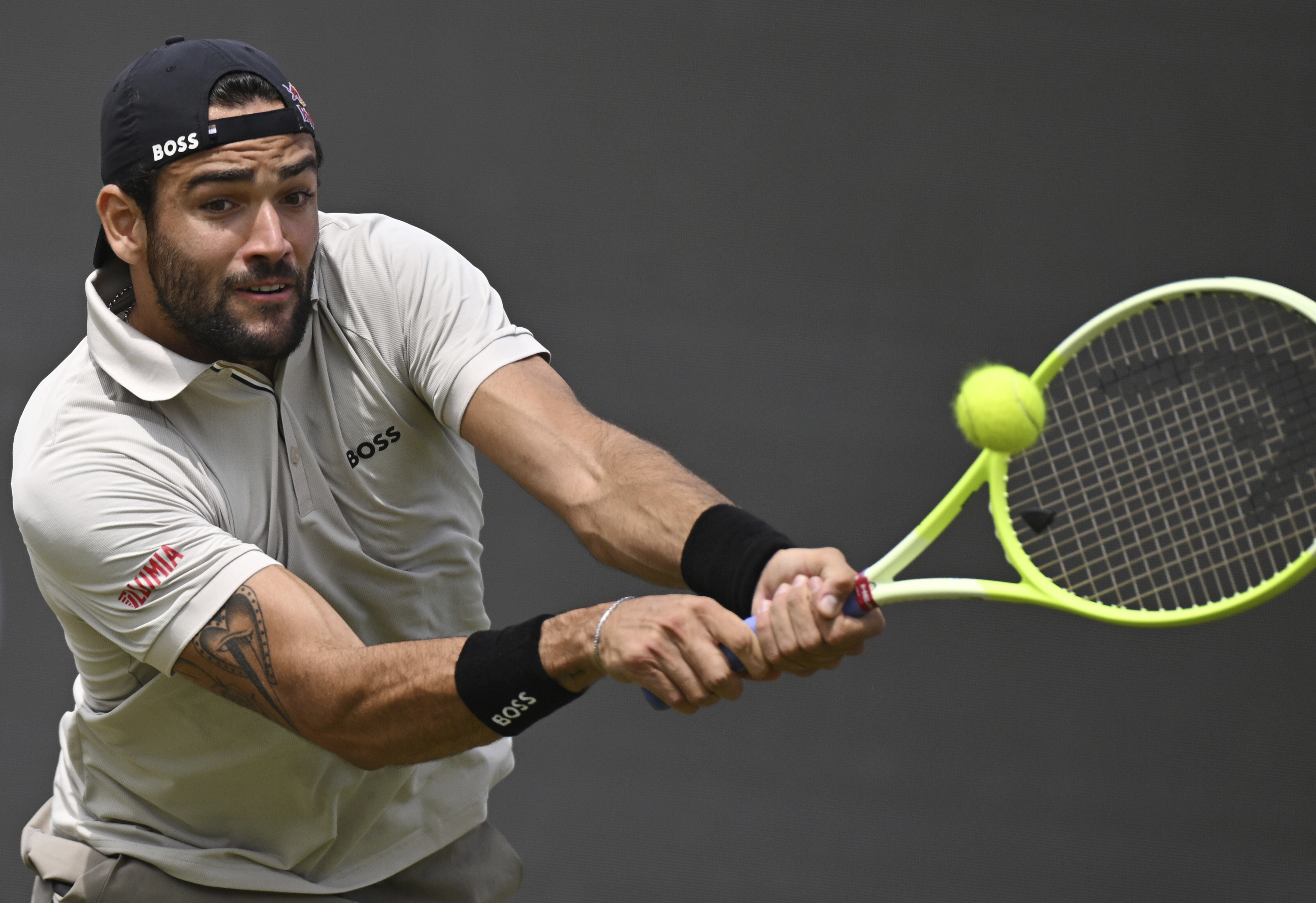Italy's Matteo Berrettini in action against Britain's Jack Draper during the men's singles final match at the ATP Tour in Stuttgart, Germany, Sunday June 16, 2024. (Marijan Murat/dpa via AP)