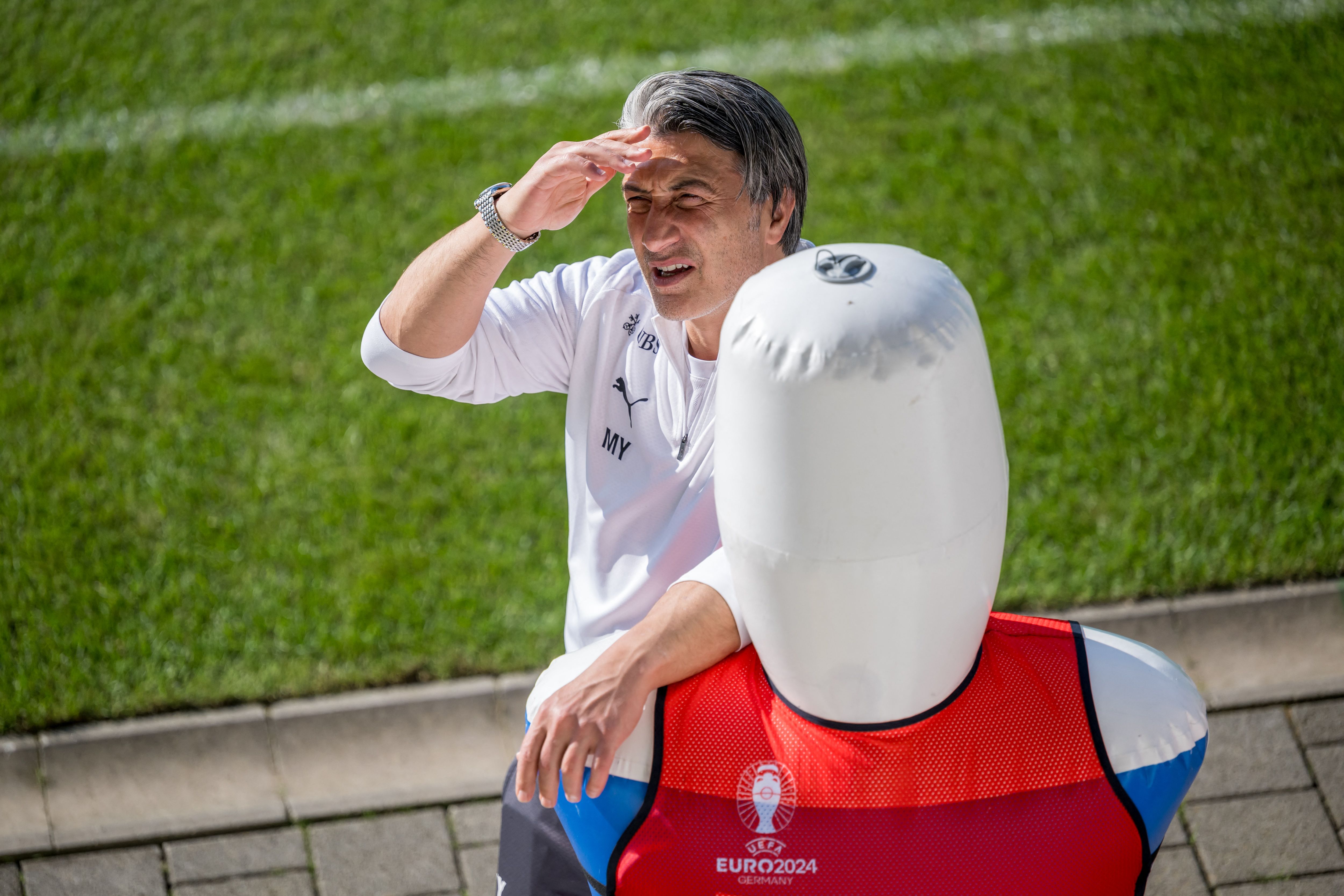 Switzerland's head coach Murat Yakin attends a training session of Team Switzerland during the UEFA Euro 2024 Football Championship, at the Stadion auf der Waldau in Stuttgart on June 24, 2024.  (Photo by Fabrice COFFRINI / AFP)
