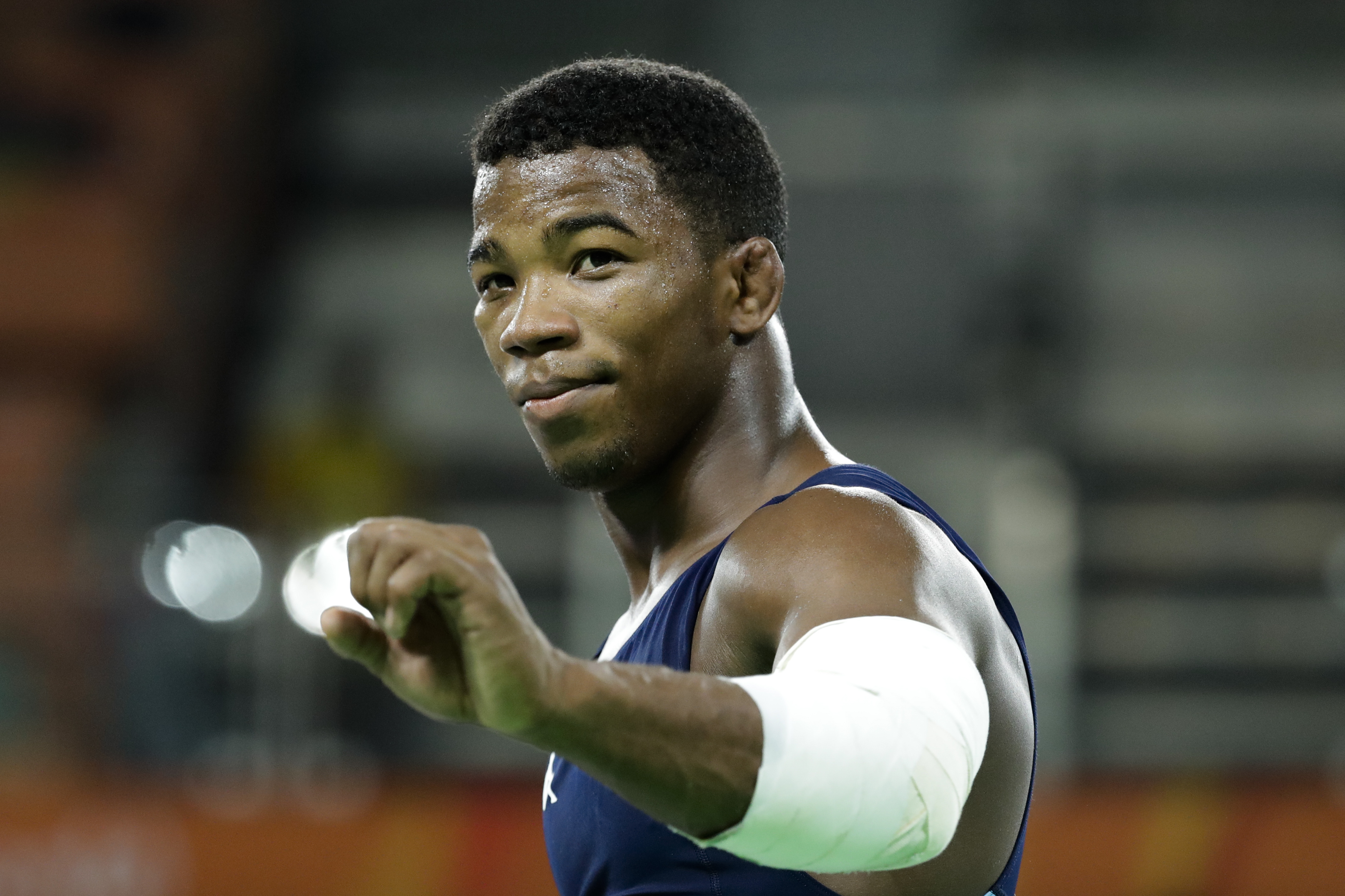 FILE - Italy's Frank Chamizo Marquez celebrates after winning the bronze medal during the men's 65-kg freestyle wrestling competition at the 2016 Summer Olympics in Rio de Janeiro, Brazil, Aug. 21, 2016. Two-time world champion and Olympic bronze medalist Frank Chamizo has claimed he turned down a bribe of $300,000 to throw a match at last week?s European wrestling Olympic qualification tournament in Baku, Azerbaijan. Chamizo ended up controversially losing the semifinal match to Azerbaijani freestyle wrestler Turan Bayramov following a disputed late call. (AP Photo/Markus Schreiber, File)