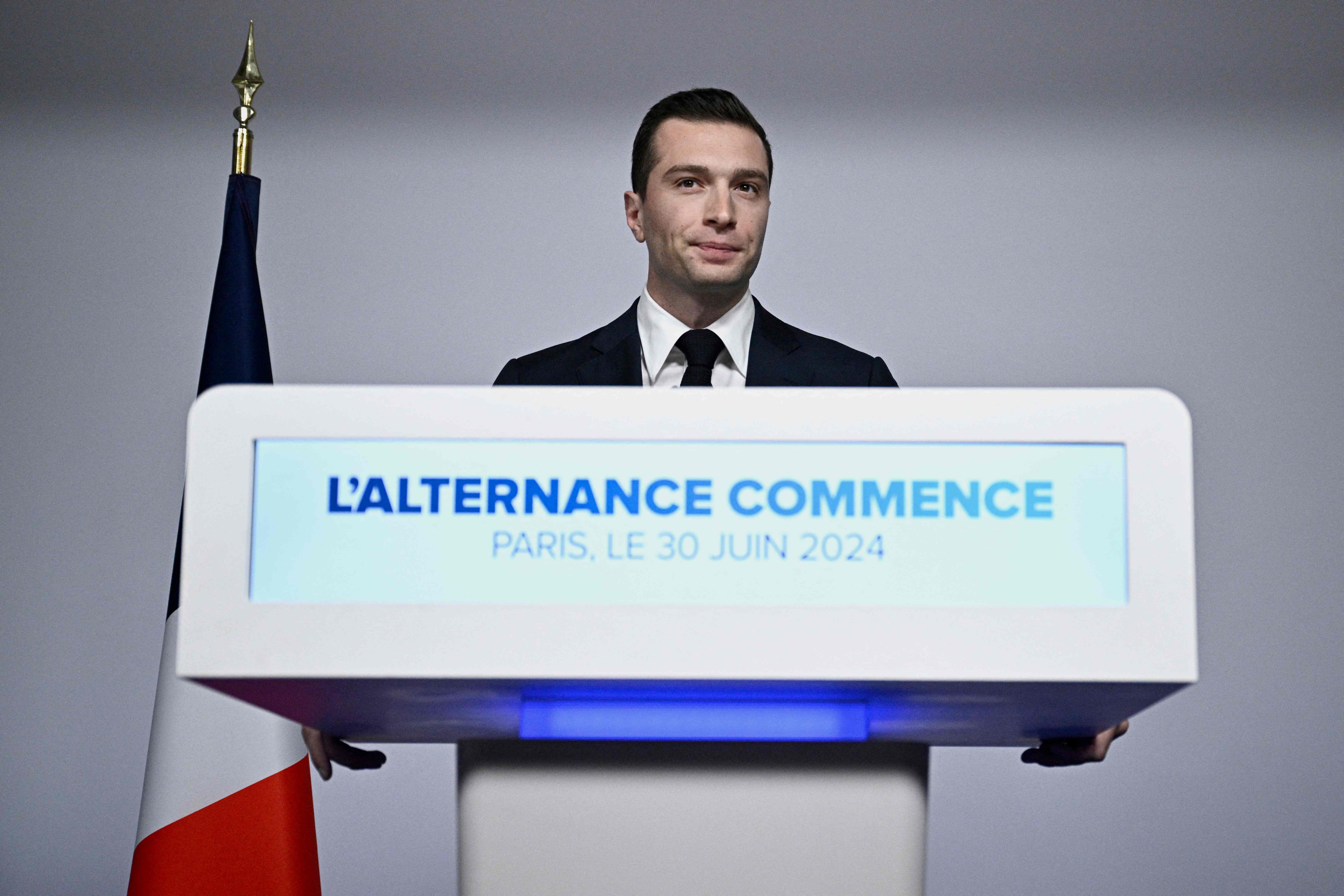 French far-right Rassemblement National (RN) political party President and lead MEP Jordan Bardella gives a speech during the results evening of the first round of the parliamentary elections in Paris on June 30, 2024. France's far right won the first round of pivotal legislative elections on June 30, 2024, with the centrist forces of France's President coming in only third behind the left after the highest turnout in over four decades, estimates said. (Photo by JULIEN DE ROSA / AFP)