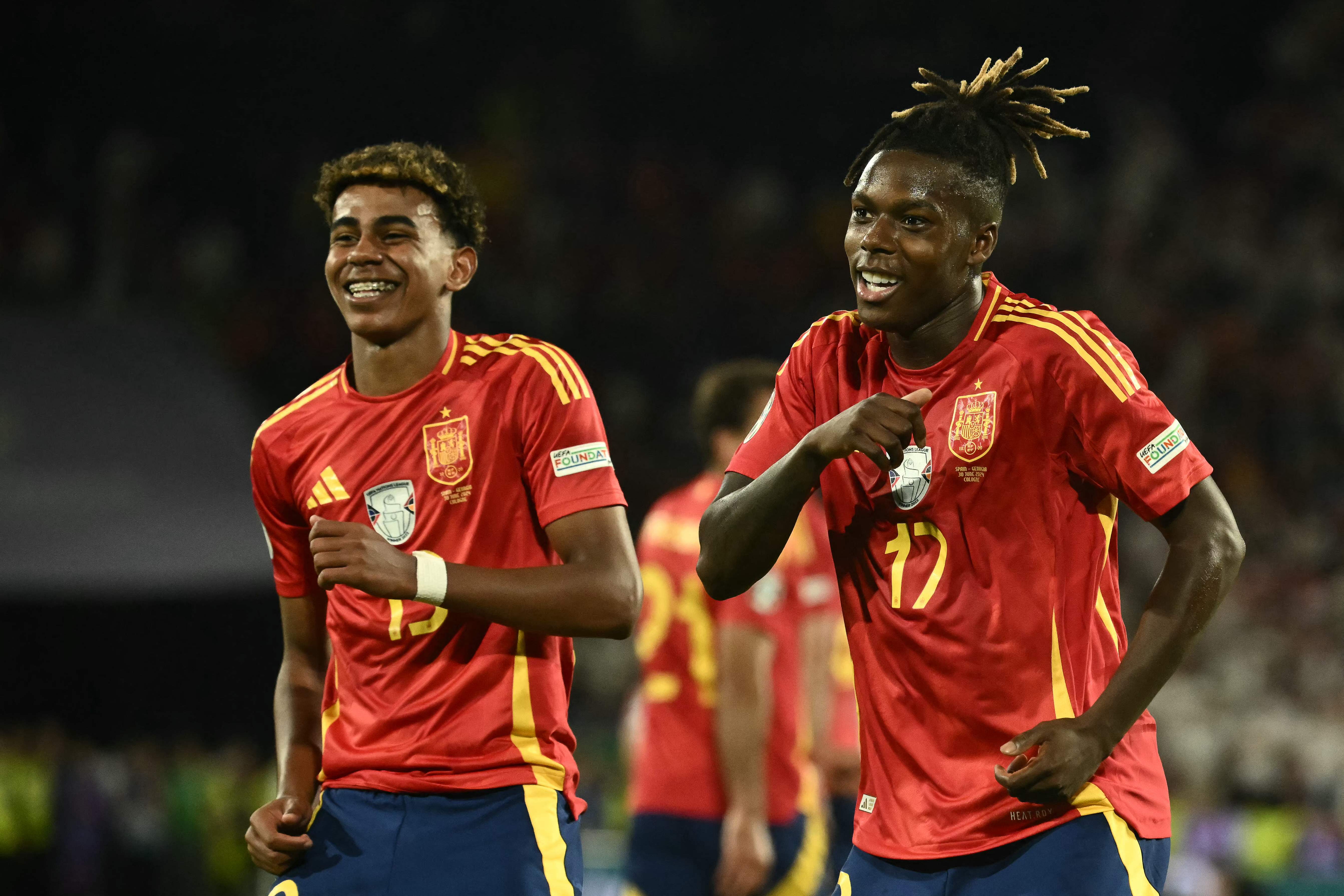 Spain's midfielder #17 Nico Williams celebrates scoring his team's third goal with his teammates including Spain's forward #19 Lamine Yamal during the UEFA Euro 2024 round of 16 football match between Spain and Georgia at the Cologne Stadium in Cologne on June 30, 2024. (Photo by Angelos Tzortzinis / AFP)