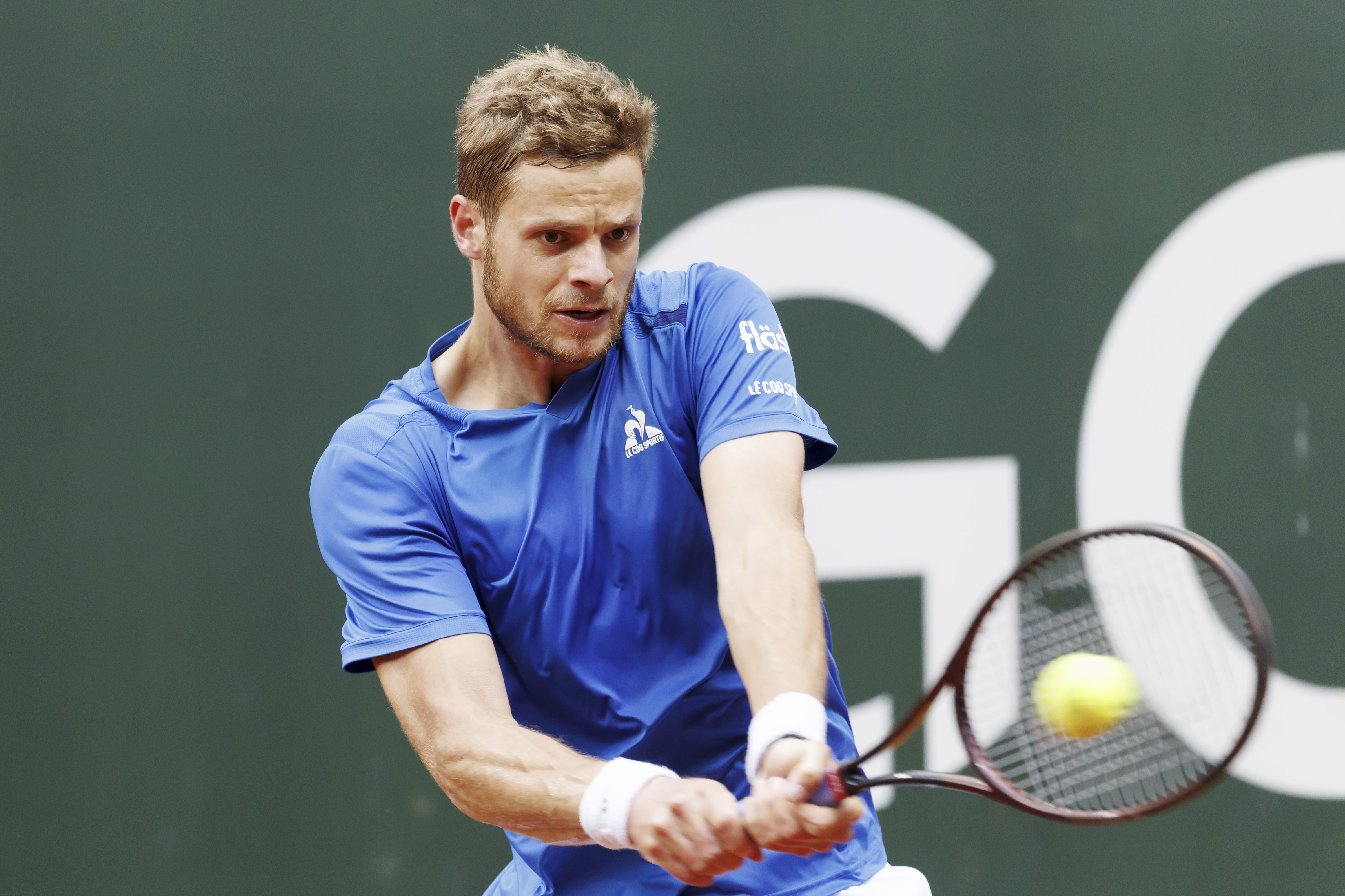 Yannick Hanfmann, of Germany, returns a ball to Novak Djokovic, of Serbia, during their second round match of the ATP 250 Geneva Open tennis tournament in Geneva, Switzerland, Wednesday, May 22, 2024. (Salvatore Di Nolfi/Keystone via AP)