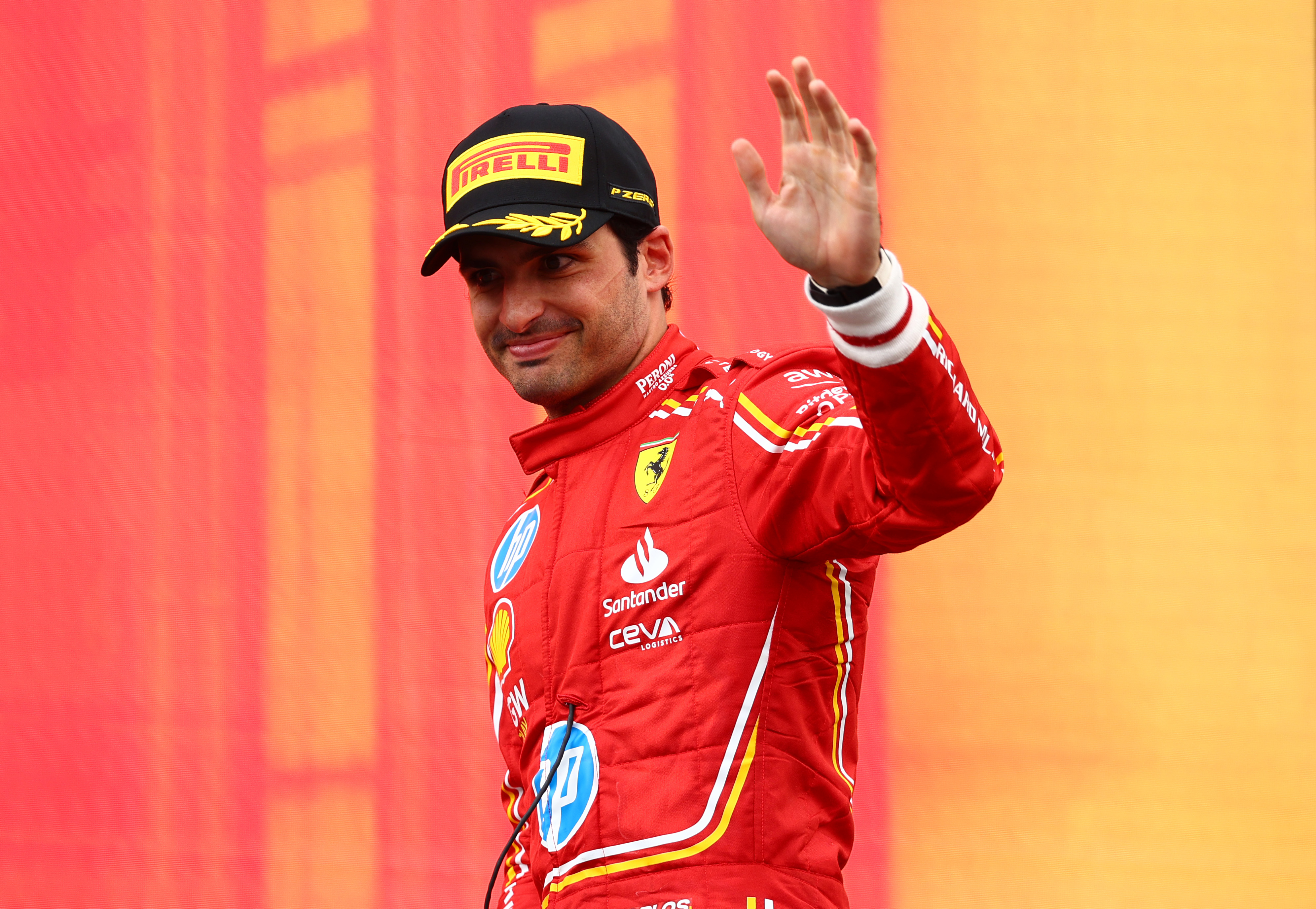 SPIELBERG, AUSTRIA - JUNE 30: Third placed Carlos Sainz of Spain and Ferrari celebrates on the podium during the F1 Grand Prix of Austria at Red Bull Ring on June 30, 2024 in Spielberg, Austria. (Photo by Clive Rose/Getty Images)