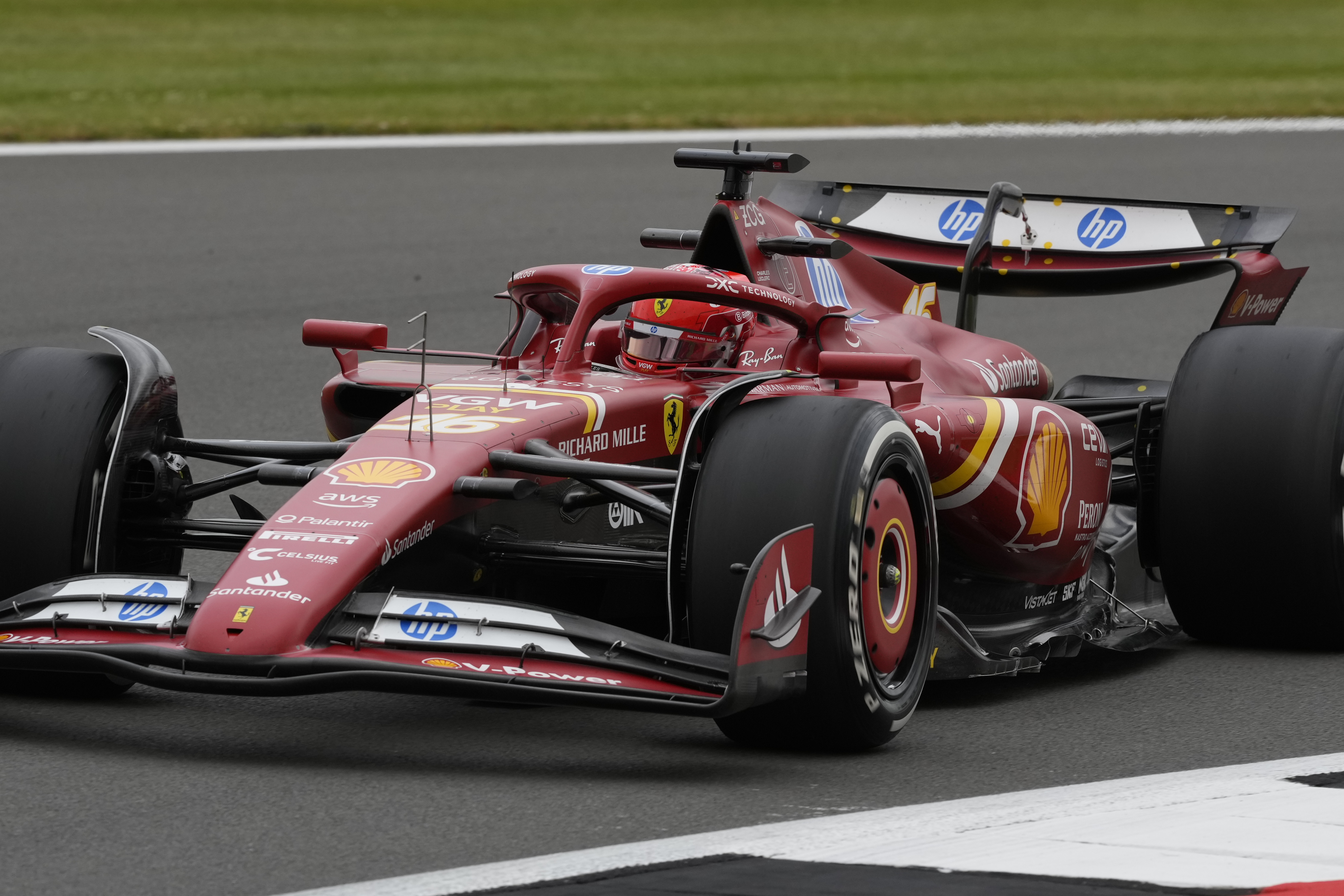 Ferrari driver Charles Leclerc of Monaco steers his car during the first free practice at the Silverstone racetrack, Silverstone, England, Friday, July 5, 2024. The British Formula One Grand Prix will be held on Sunday. (AP Photo/Luca Bruno)