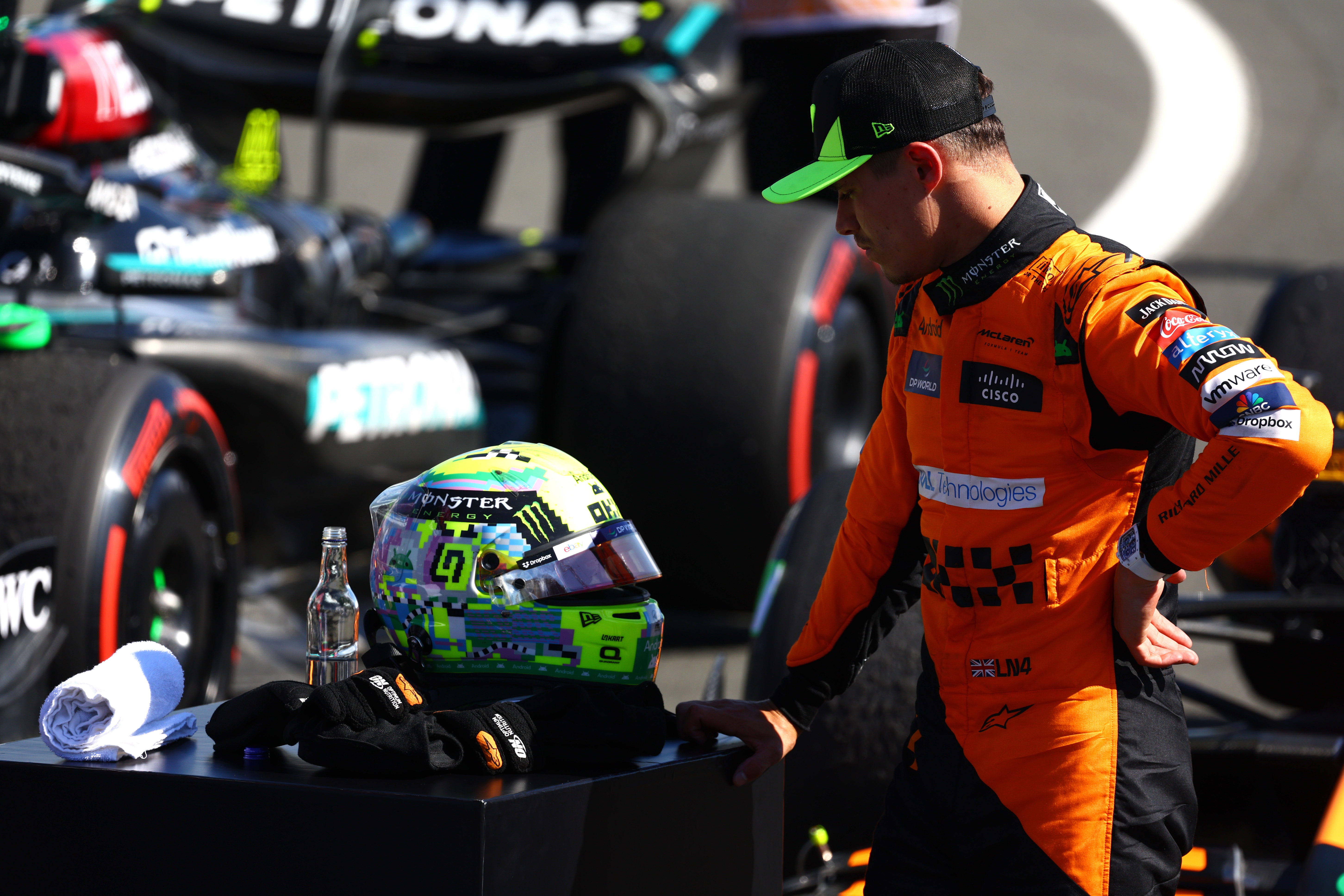 NORTHAMPTON, ENGLAND - JULY 07: Third placed Lando Norris of Great Britain and McLaren looks on in parc ferme during the F1 Grand Prix of Great Britain at Silverstone Circuit on July 07, 2024 in Northampton, England. (Photo by Mark Thompson/Getty Images)