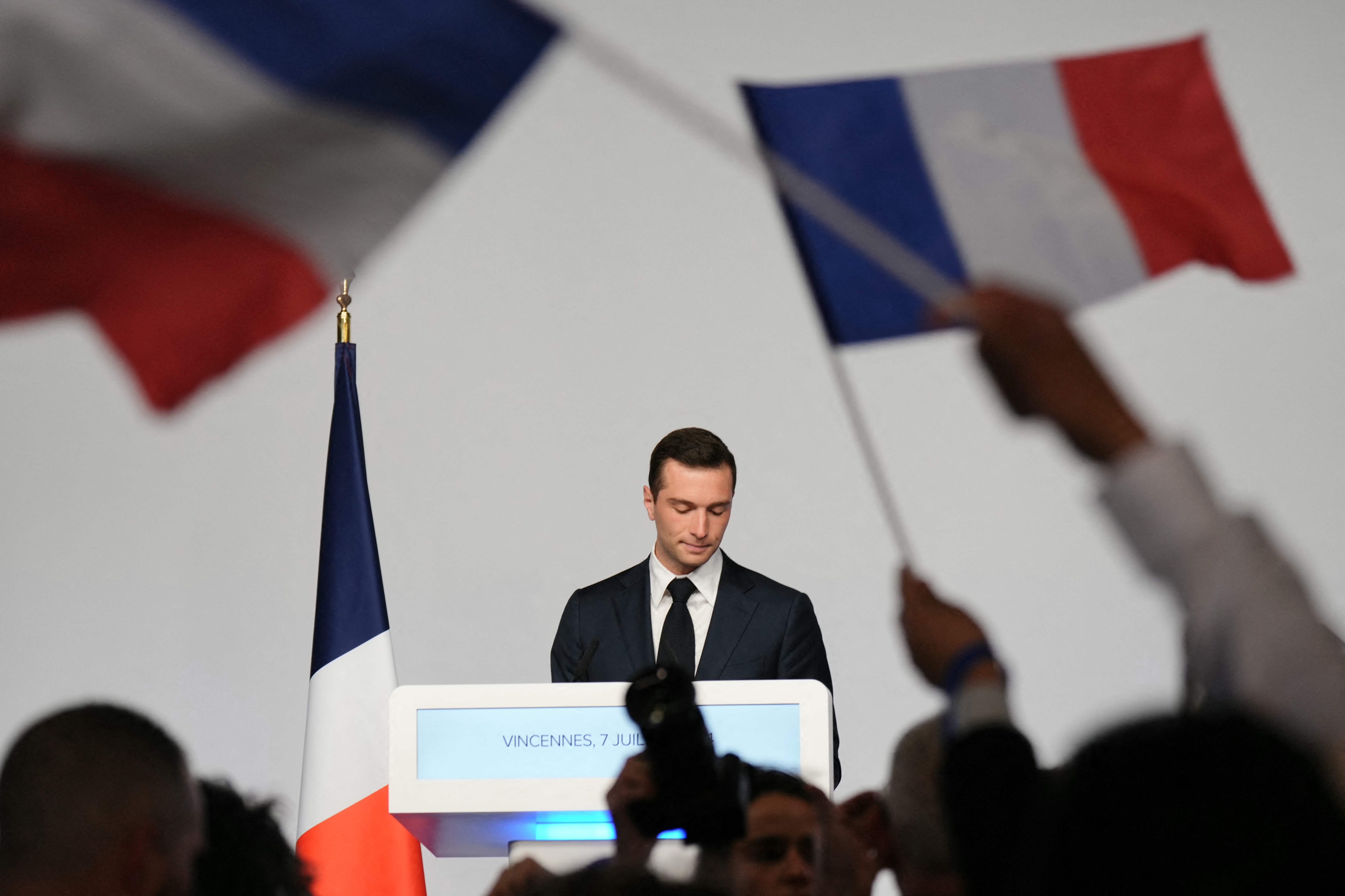TOPSHOT - French Rassemblement National (RN) far-right party's president Jordan Bardella speaks during the party's election night following the first results of the second round of France's legislative election in Paris on July 7, 2024. (Photo by Dimitar DILKOFF / AFP)