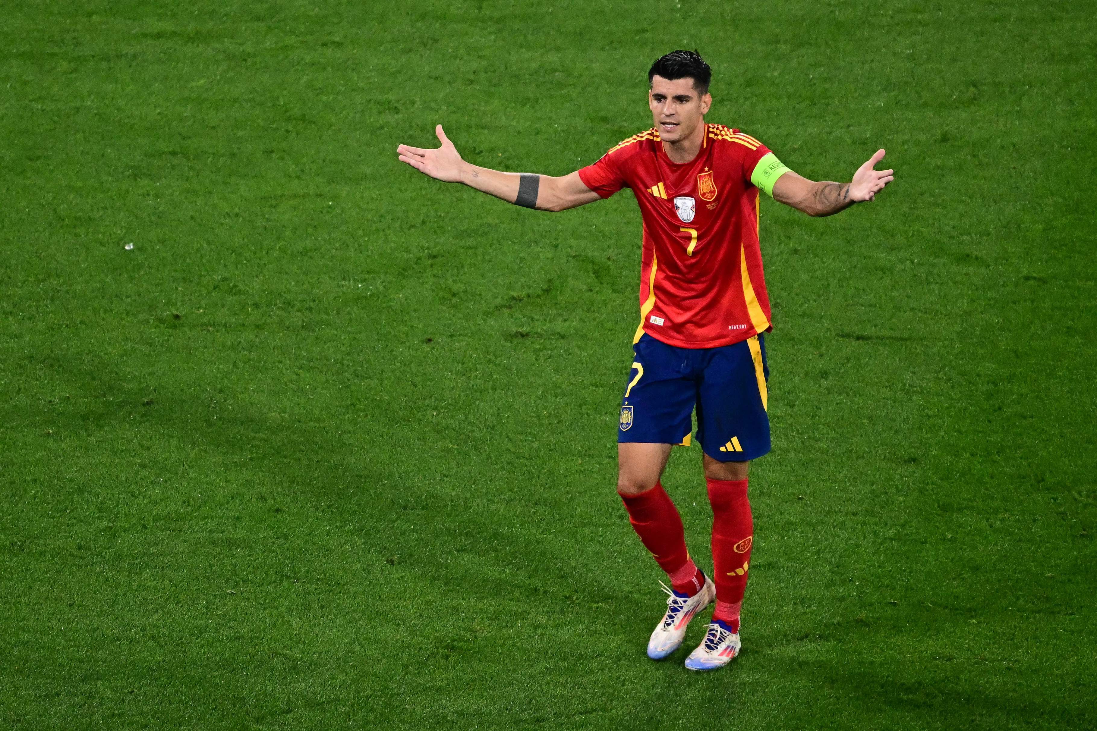Spain's forward #07 Alvaro Morata reacts during the UEFA Euro 2024 semi-final football match between Spain and France at the Munich Football Arena in Munich on July 9, 2024. (Photo by Tobias SCHWARZ / AFP)