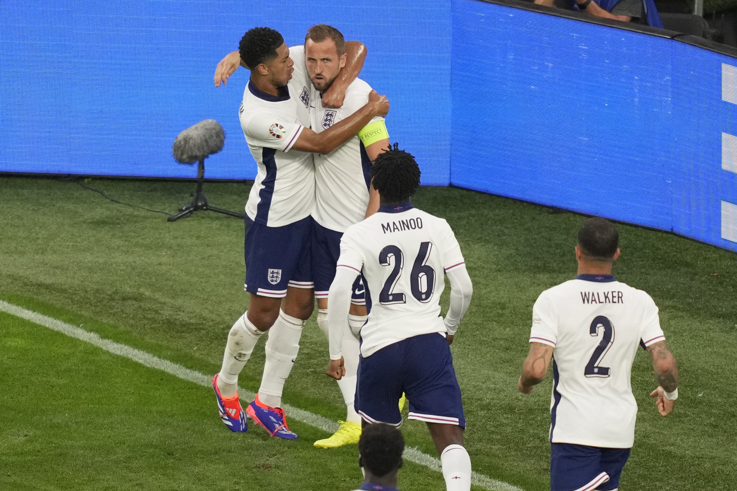 England's Harry Kane celebrates after scoring his side's opening goal from a penalty kick during a semifinal match between the Netherlands and England at the Euro 2024 soccer tournament in Dortmund, Germany, Wednesday, July 10, 2024. (AP Photo/Andreea Alexandru)