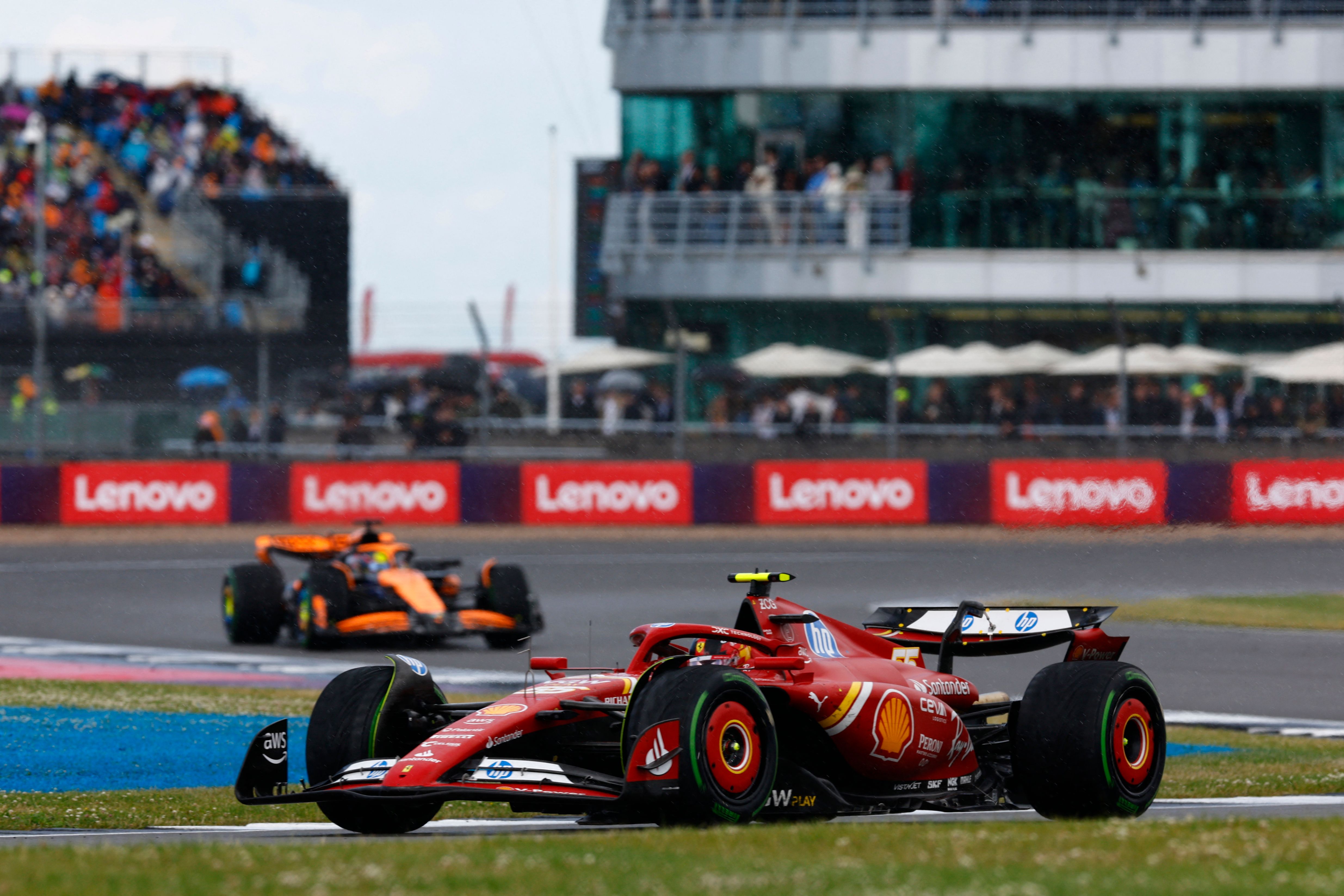 Ferrari's Spanish driver Carlos Sainz Jr competes in the Formula One British Grand Prix at the Silverstone motor racing circuit in Silverstone, central England, on July 7, 2024. (Photo by BENJAMIN CREMEL / AFP)