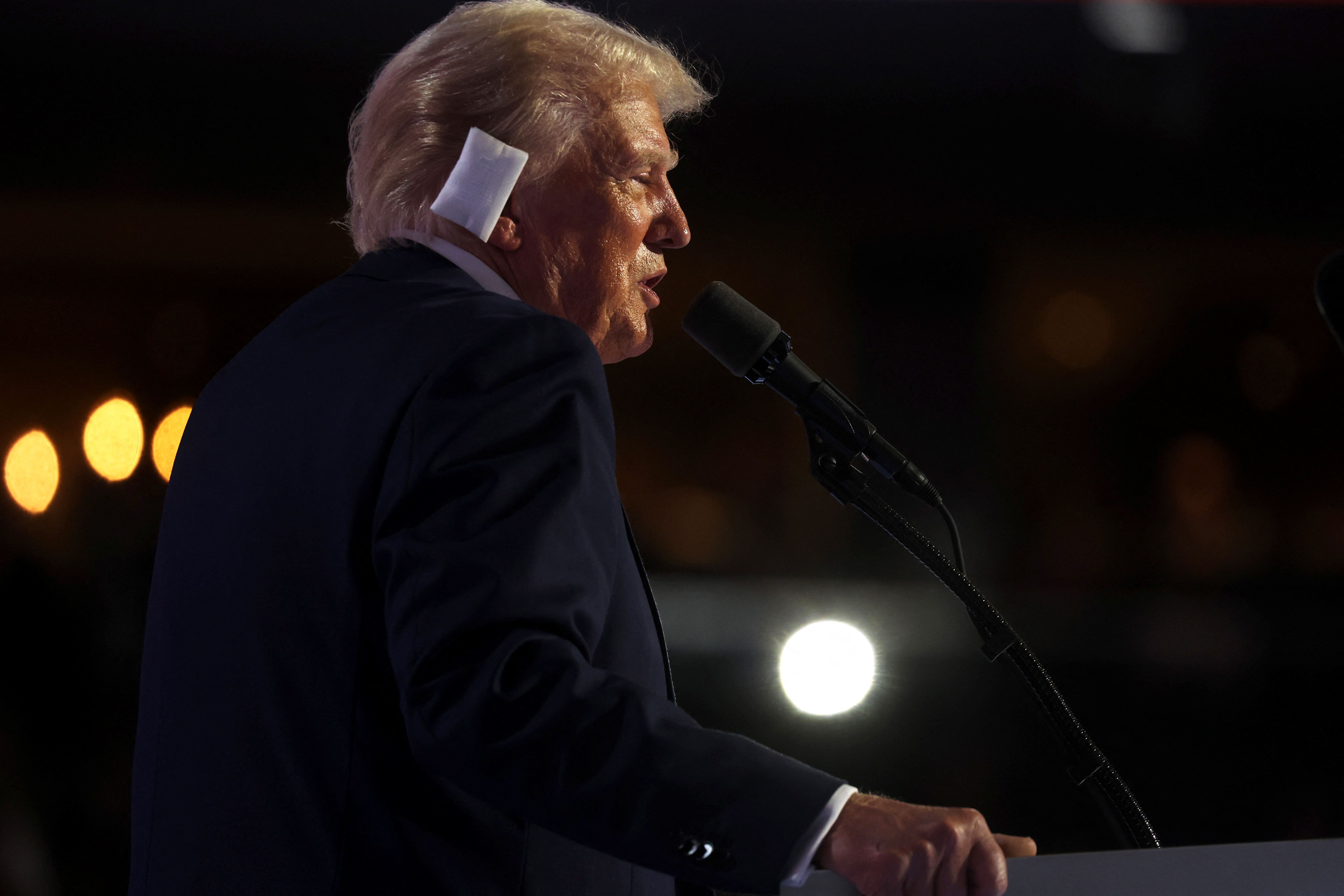 MILWAUKEE, WISCONSIN - JULY 18: Former President Donald Trump speaks at the Republican National Convention (RNC) on the fourth and final day of the event on July 18, 2024 in Milwaukee, Wisconsin. Security throughout downtown Milwaukee remains high following the assassination attempt on former President Donald Trump over the weekend. Thousands of delegates, politicians and the Republican faithful have arrived into the traditionally Democratic city for the annual convention which will conclude with former President Donald Trump accepting his party's presidential nomination. The RNC takes place from July 15-18.   Spencer Platt/Getty Images/AFP (Photo by SPENCER PLATT / GETTY IMAGES NORTH AMERICA / Getty Images via AFP)