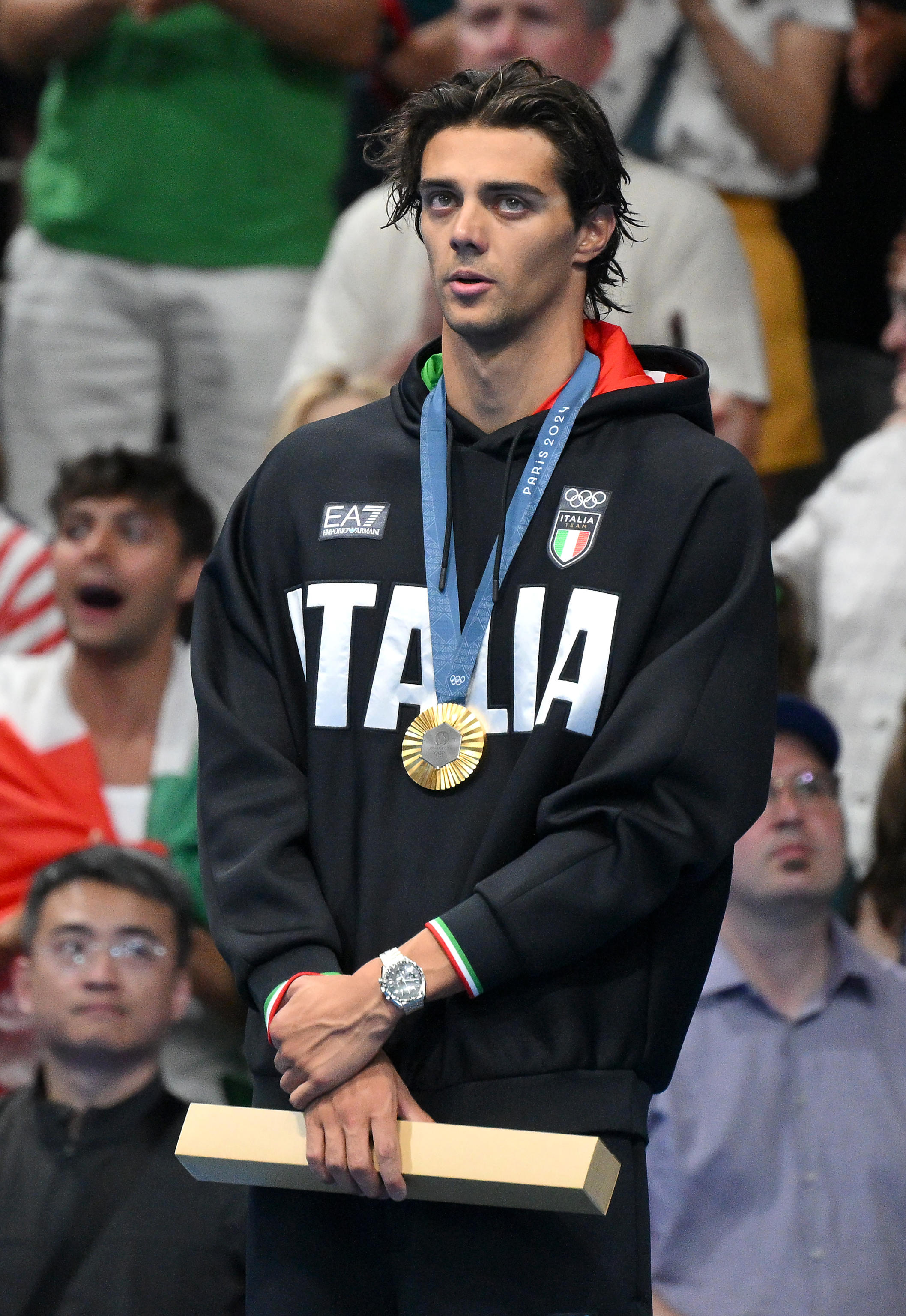 Italian Thomas Ceccon celebrates with the gold medal after winning the Men's 100m Backstroke Final of the Swimming competitions during the Paris 2024 Olympic Games at the Paris La Defense Arena in Paris, France, 29 July 2024. Summer Olympic Games will be held in Paris from 26 July to 11 August 2024.   ANSA/ETTORE FERRARI