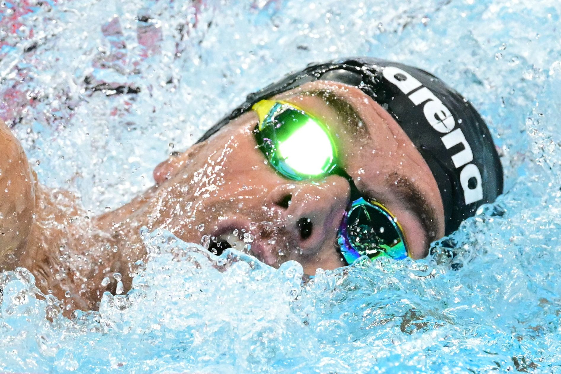 Italy's Gregorio Paltrinieri competes in a heat of the men's 800m freestyle swimming event during the Paris 2024 Olympic Games at the Paris La Defense Arena in Nanterre, west of Paris, on July 29, 2024. (Photo by François-Xavier MARIT / AFP)