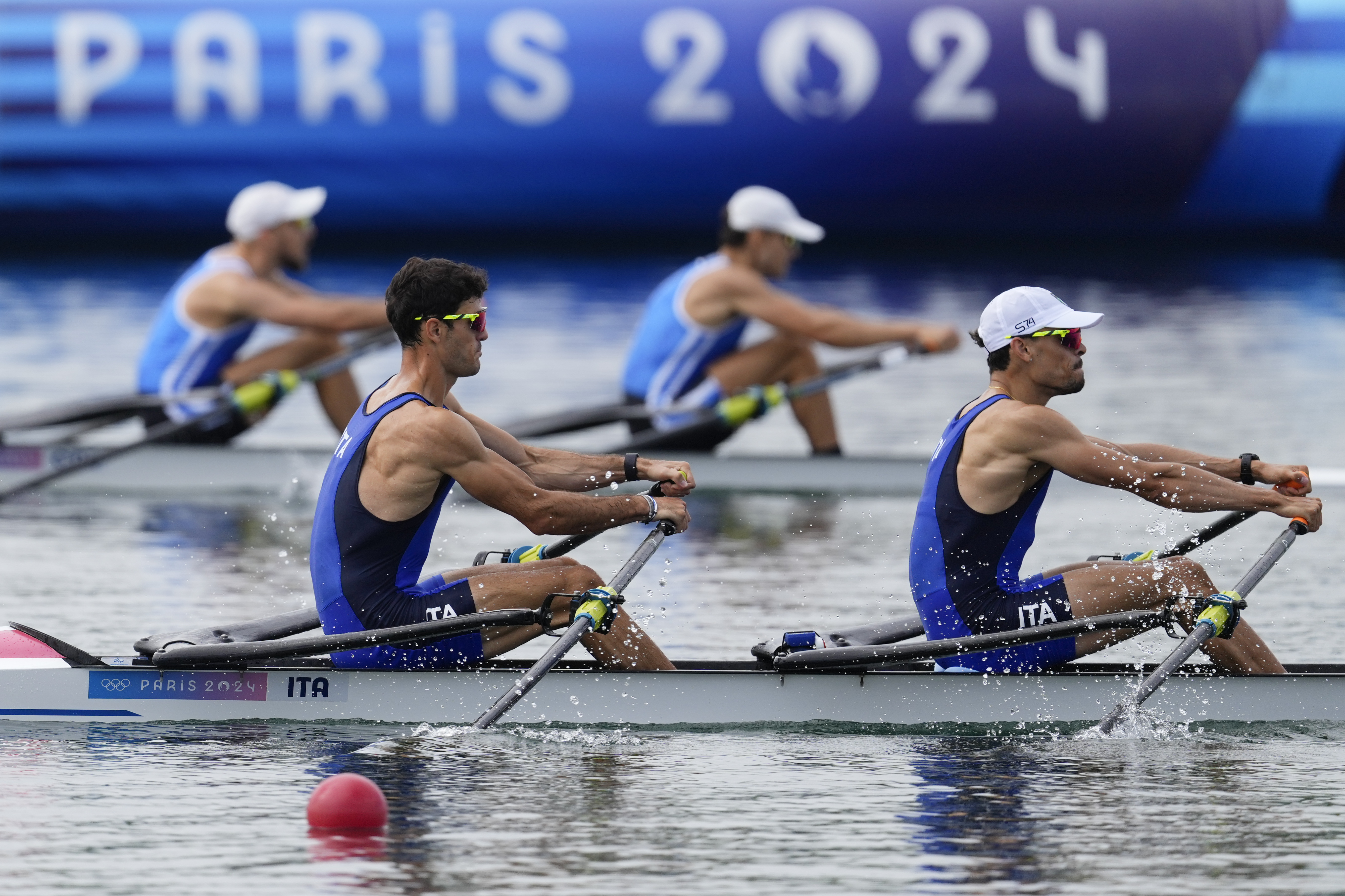 Italy's Stefano Oppo and Gabriel Soares compete during the men's lightweight double sculls rowing semifinal at the 2024 Summer Olympics, Wednesday, July 31, 2024, in Vaires-sur-Marne, France. (AP Photo/Lindsey Wasson)