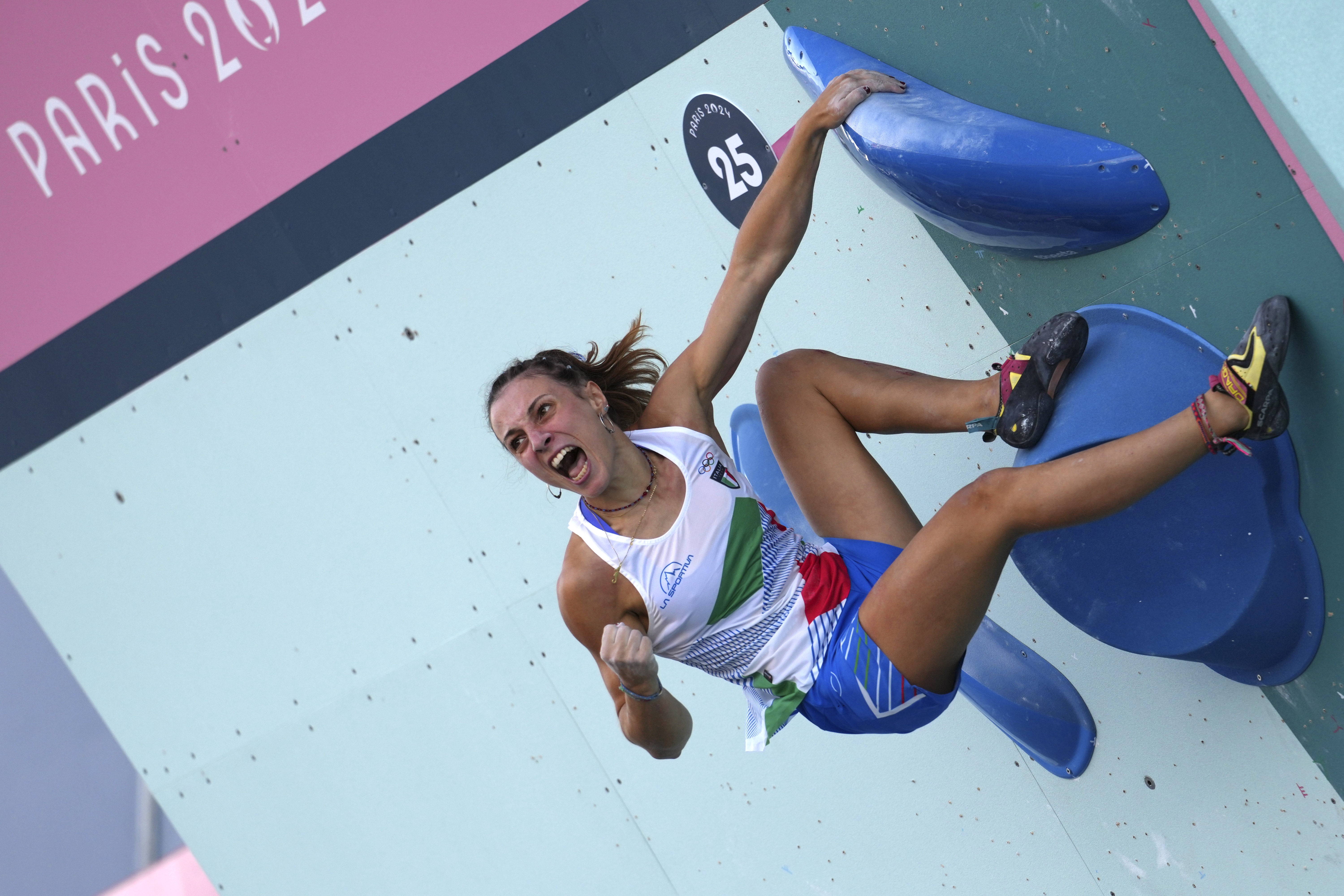 Camilla Moroni of Italy competes in the women's boulder and lead, semi-final boulder, sport climbing competition at the 2024 Summer Olympics, Tuesday, Aug. 6, 2024, in Le Bourget, France. (AP Photo/Tsvangirayi Mukwazhi)
