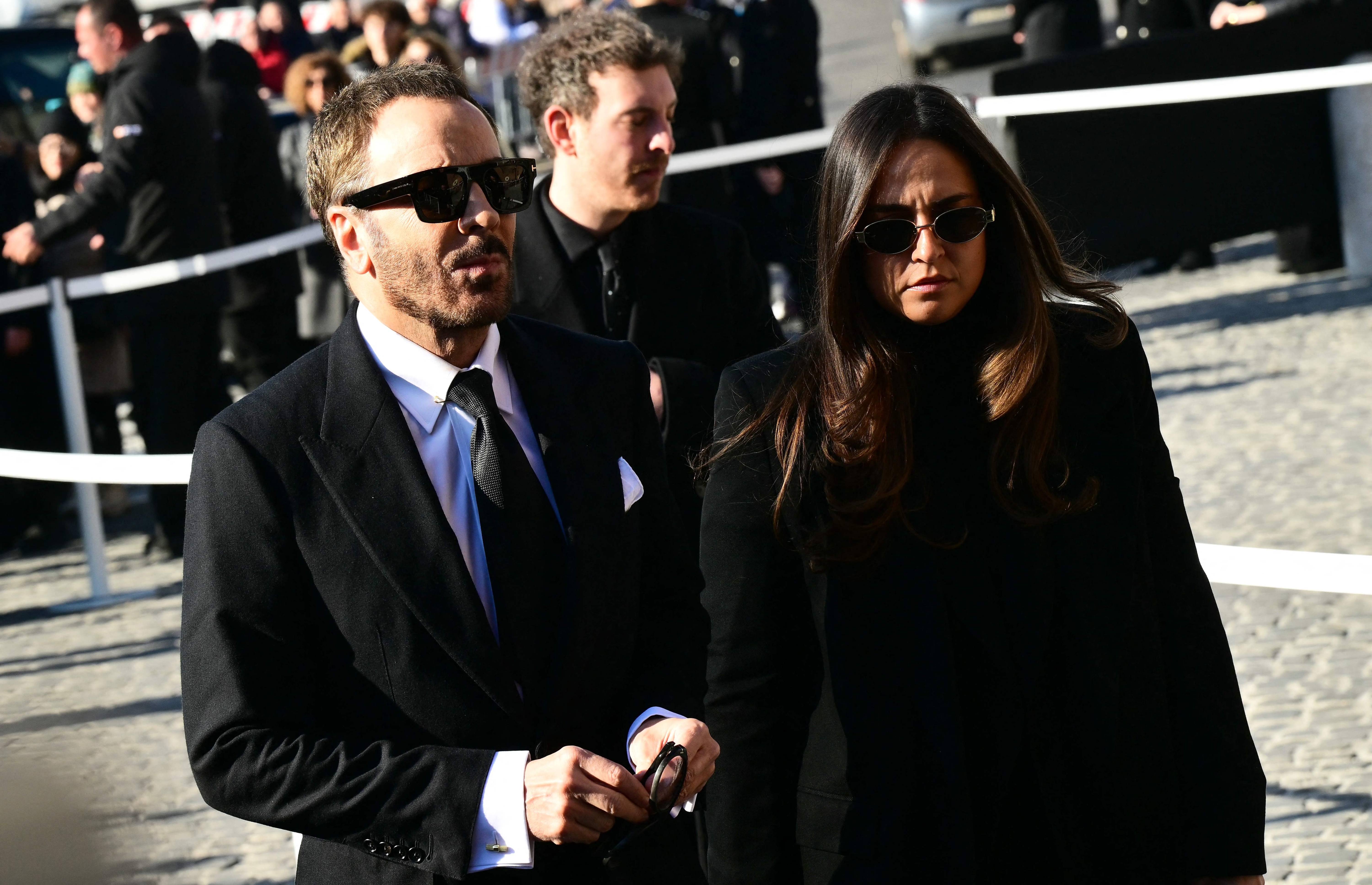 US fashion designer Tom Ford (L) arrives at the funeral ceremony for the late Italian fashion designer Valentino Gavarani at the Basilic of Santa Maria degli Angeli e dei Martiri, in Rome on January 23, 2026. (Photo by Stefano RELLANDINI / AFP)